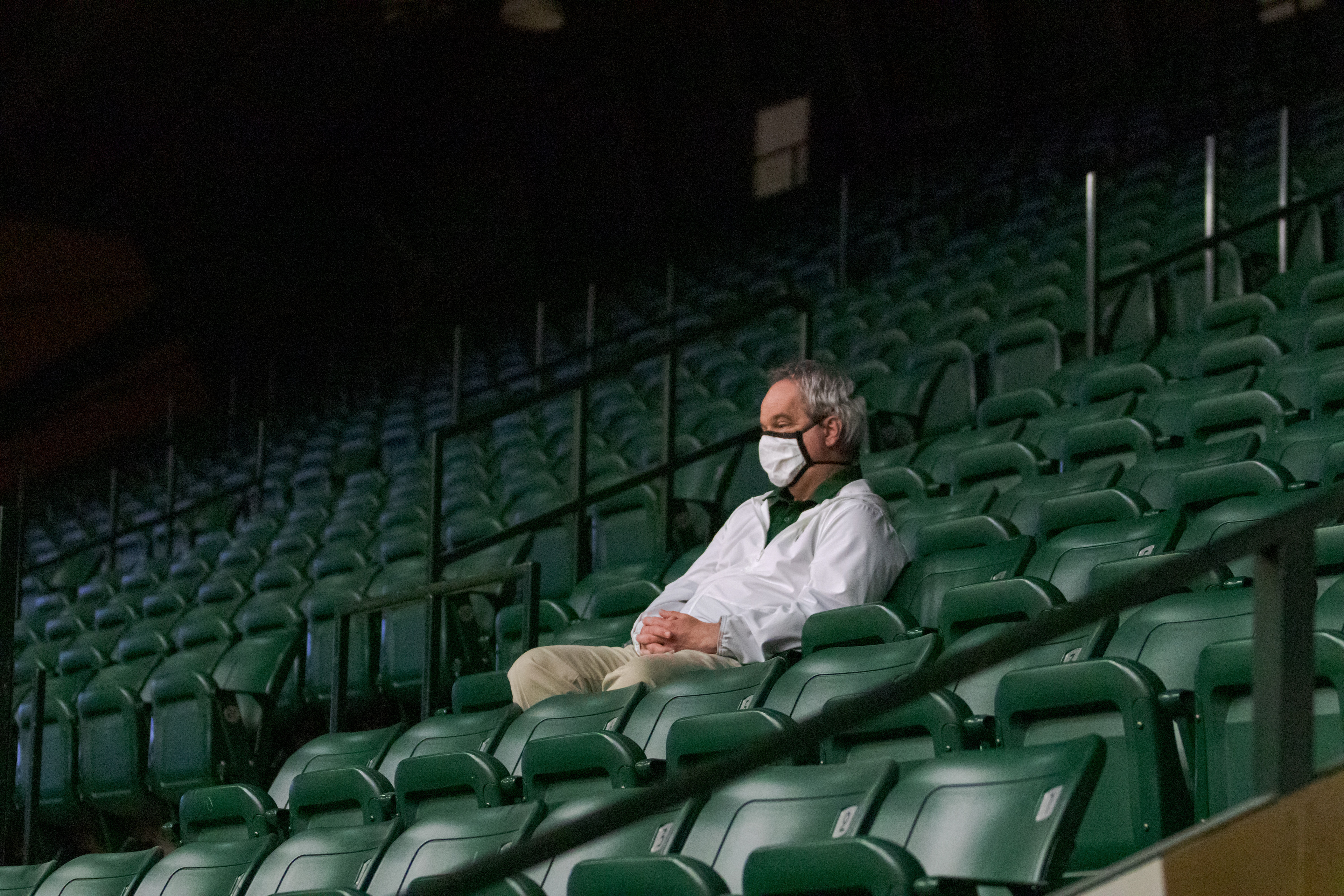 A lone spectator watches the Colorado State University versus Boise State University women's volleyball match in Moby Arena March 25, 2021. Because of the COVID-19 pandemic, CSU sports were played without spectators during the 2020-2021 school year.