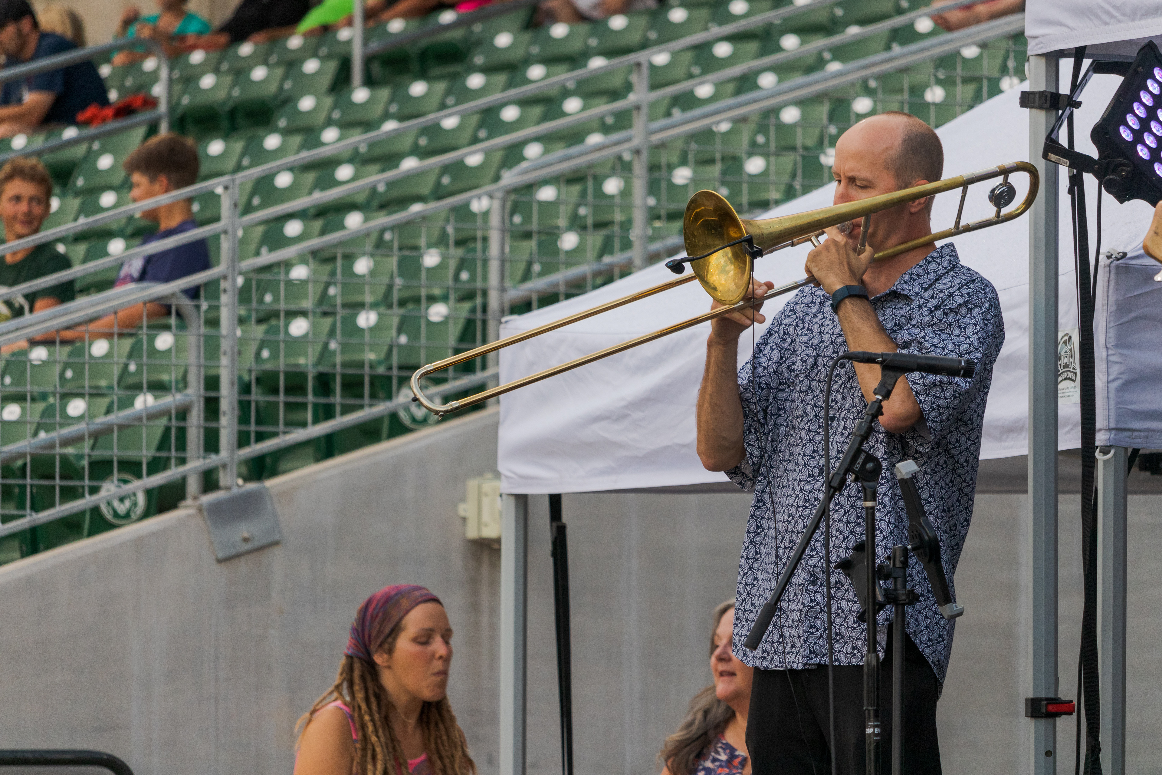 Robert Borger, trombone player for The Jakarta Band, performs in the Lagoon Summer Concert Series at Canvas Stadium July 9.