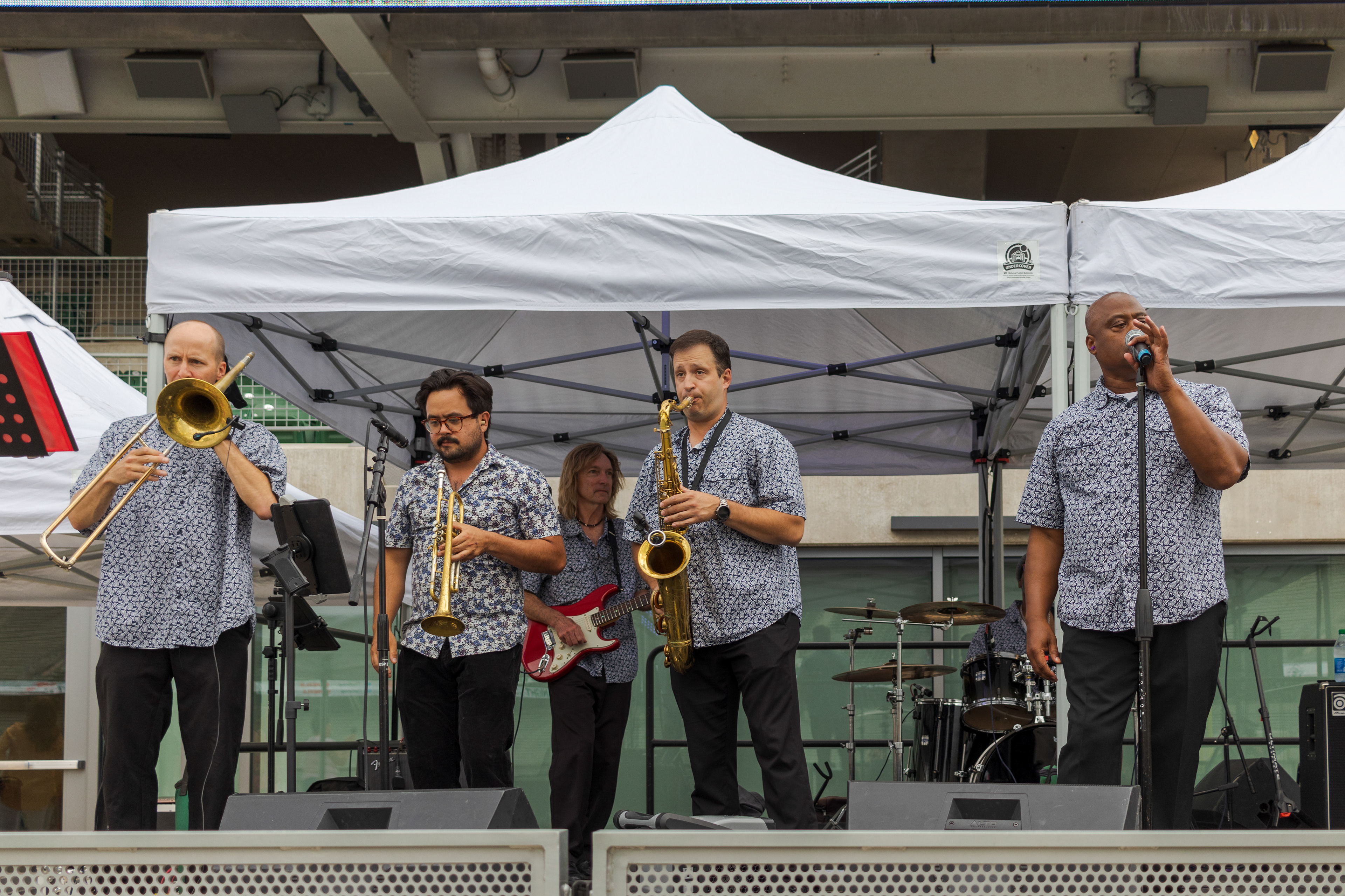 Robert Borger, Toisho Chun, Bill Sickles, Eric Stehle, and Jimi Alexander, pictured left to right, perform in The Jakarta Band at the Lagoon Summer Concert Series July 9.