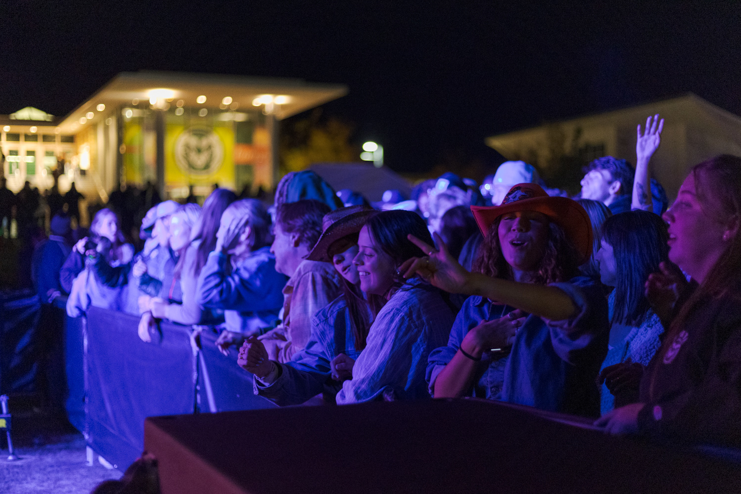 Colorado State University students dance at Friday Night Lights Oct. 13. Part of CSU's homecoming celebration, the event features performances from the marching band, color guard and cheerleaders, as well as speeches from sports coaches, a bonfire, fireworks and a DJ performance.