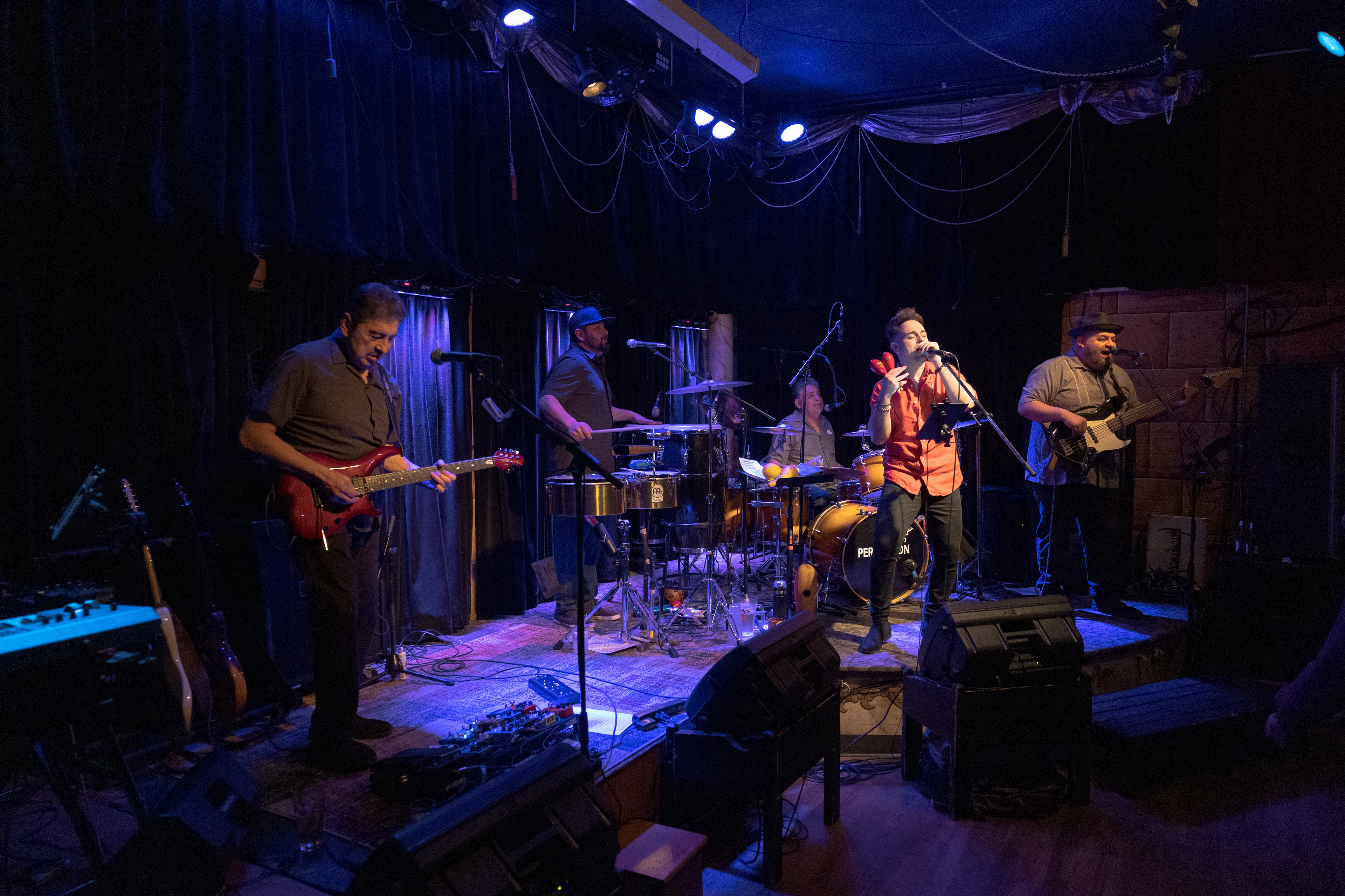 John Jimenez, Victor Jimenez, Frank Jimenez, Juan Pablo Casillas, and Ruben Alonzo of Fort Collins-based band Persuasion perform "The Sensitive Kind" at Avogadro's Number Feb. 11.