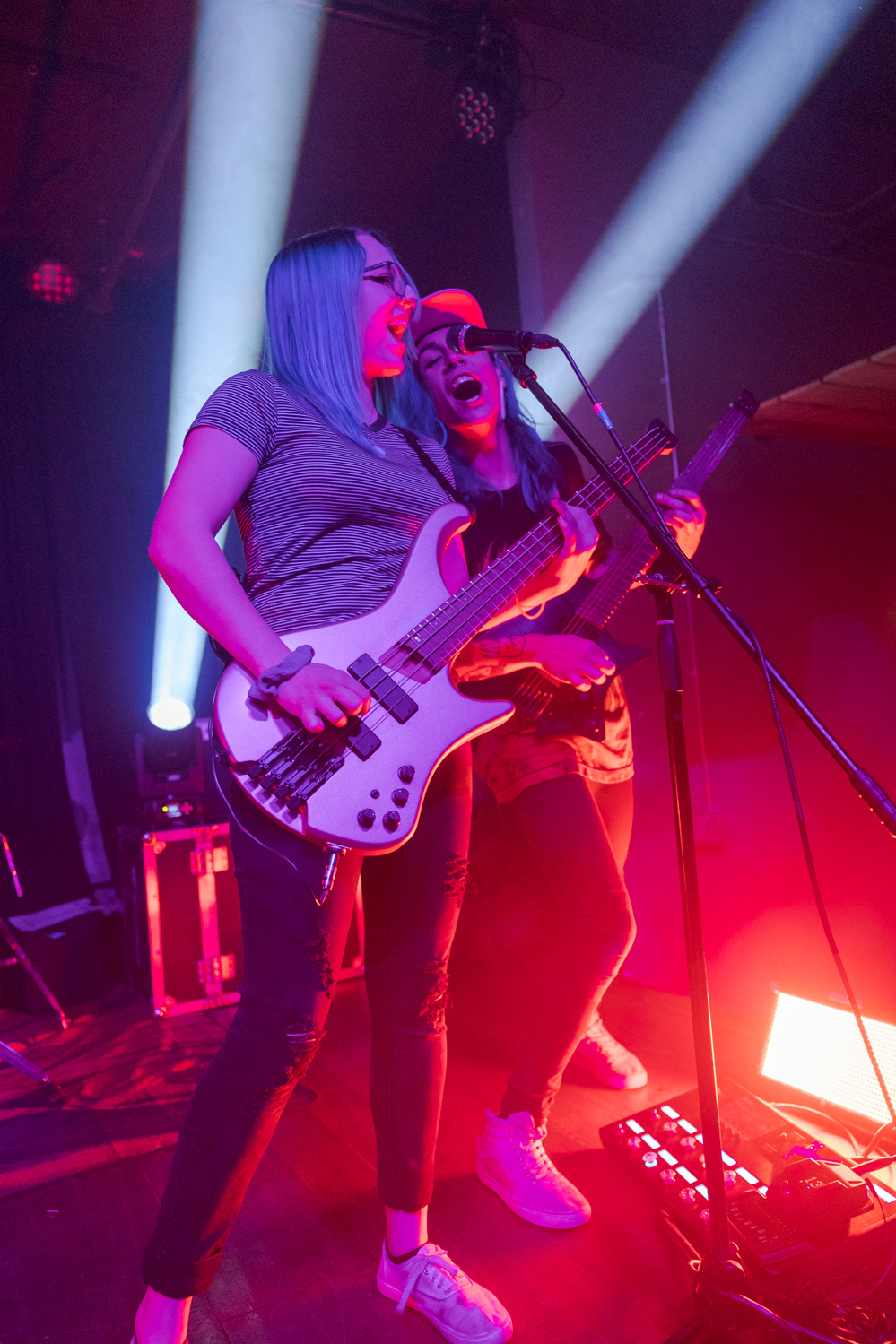Kelsey Gant and Noah Sauls of Denver, Colorado pop-punk band Suitable Miss share a microphone while performing at The Coast during the band's Fall Tour 2022, Oct. 23.