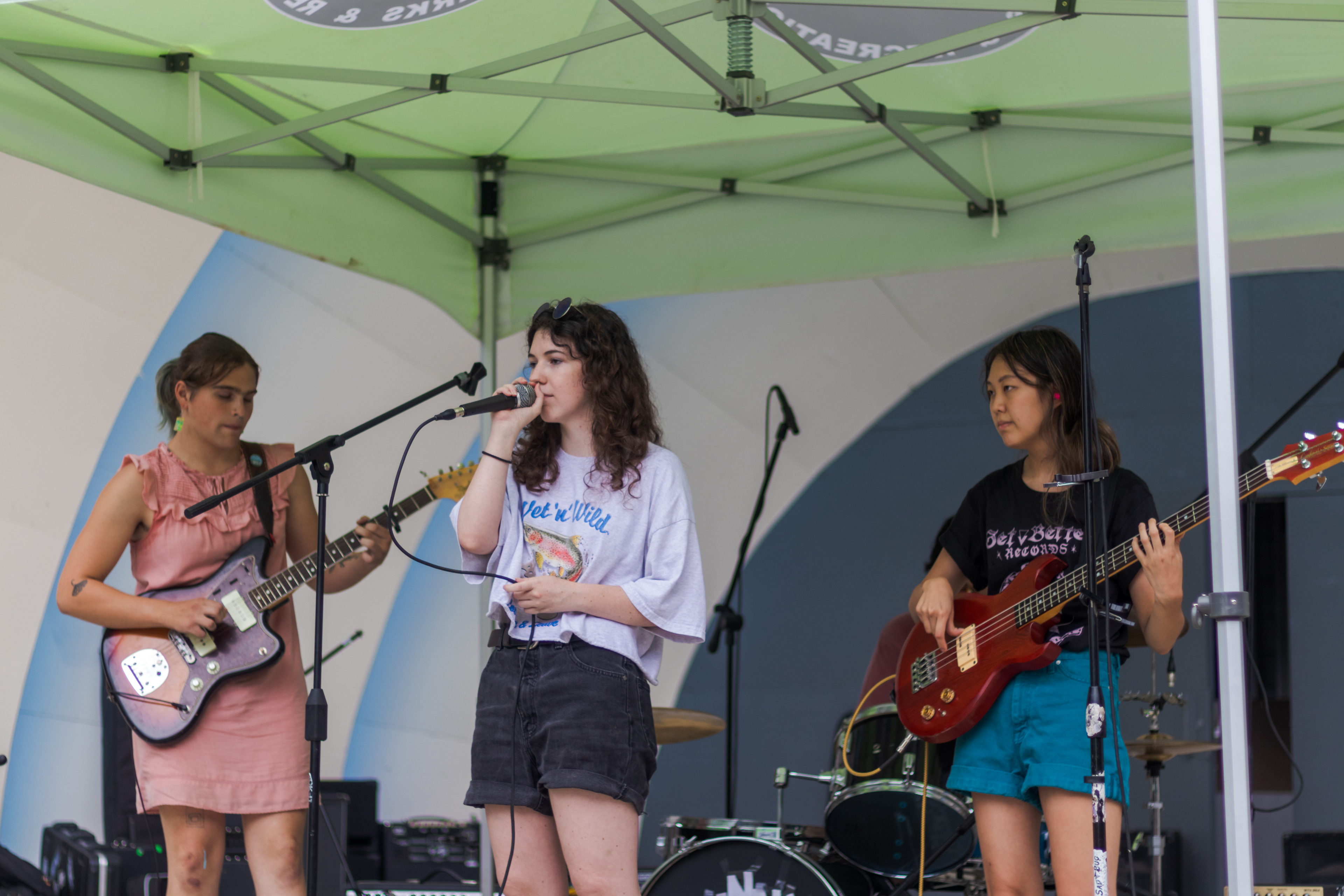 Madison Madeira, Lauren Black, and Victoria Park perform during Casual Fest at the Boulder Bandshell July 23. Black releases songs under the name Lu. 
