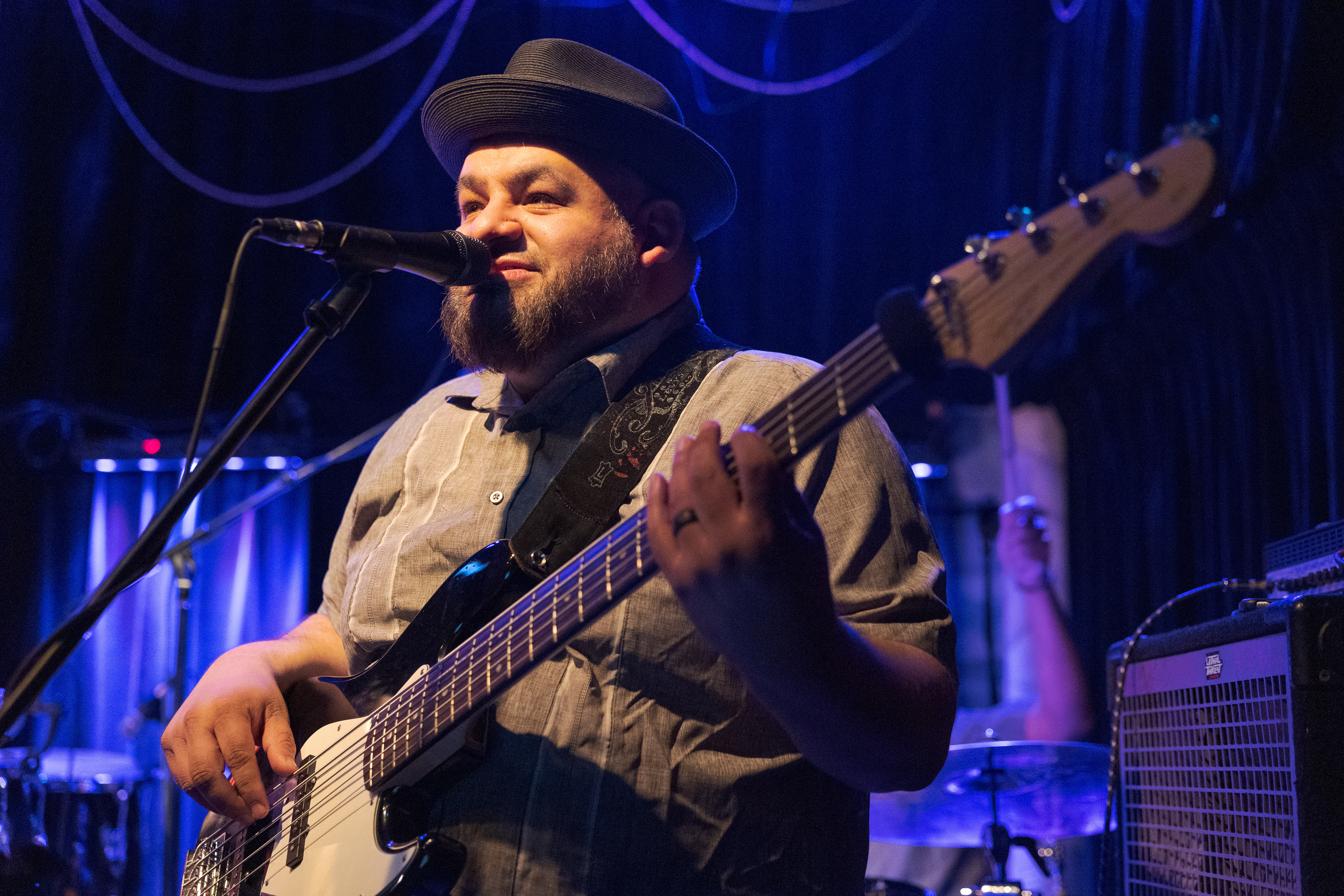 Ruben Alonzo of Fort Collins-based band Persuasion performs "Bailamos El Son" at Avogadro's Number Feb. 11. Alonzo also works for the Greeley Police Department, sings in Salsa Forte Latin Collective, and is the Music Director at City Park Church in Fort Collins.