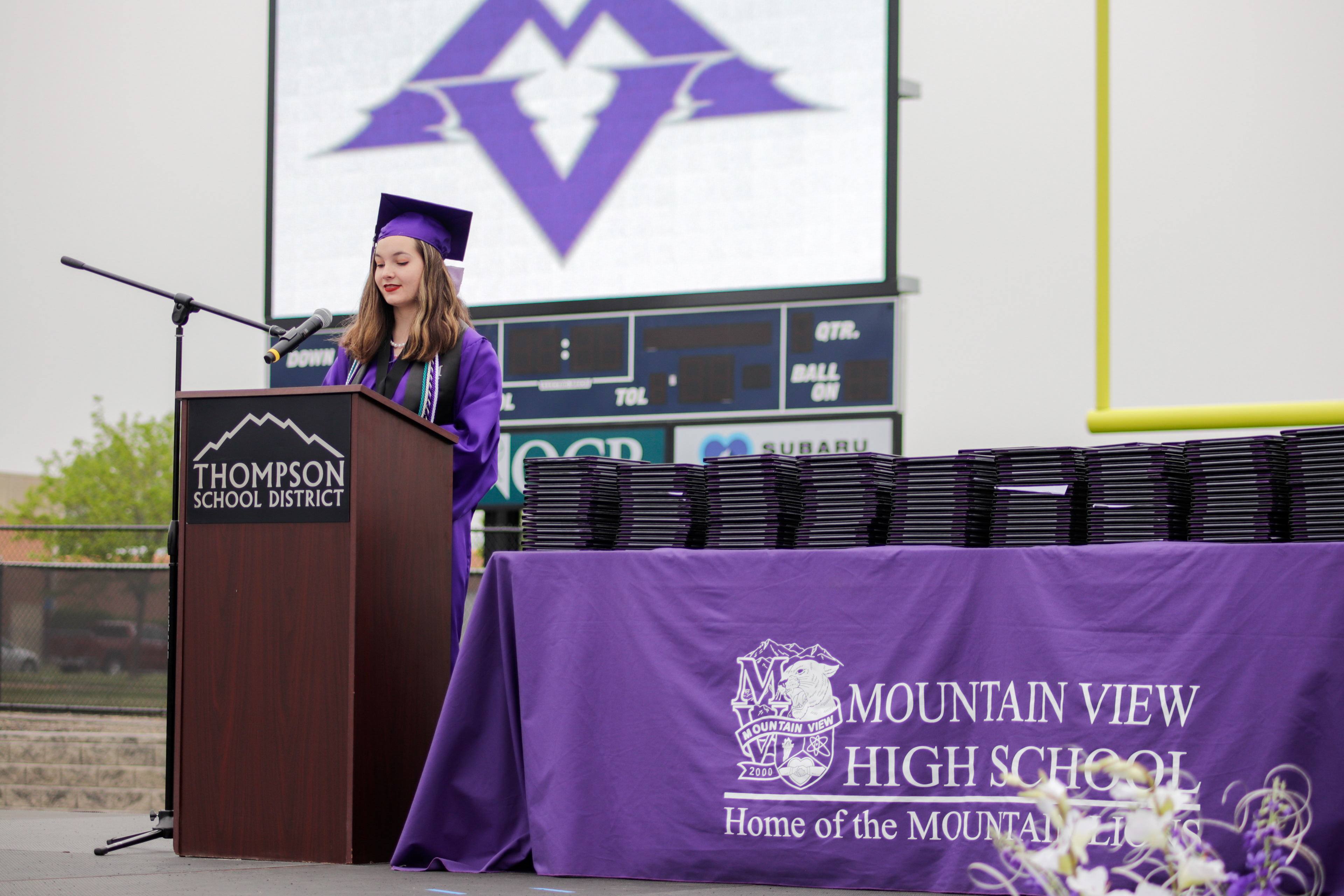 LOVELAND, CO - MAY 29, 2021: Mountain View graduate and Class Speaker Eloise Nelson speaks of her class's resilience at her graduation ceremony Saturday, May 29, 2021 at Patterson Field in Loveland. (Michael Marquardt/Loveland Reporter-Herald)