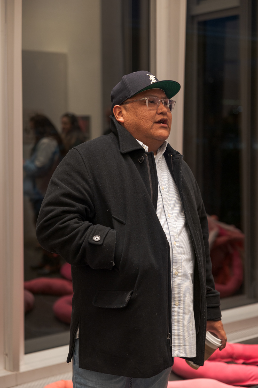 JayCee Beyale, curator for the Dairy Arts Center in Boulder, Colorado, speaks about the process of judging entries to the Colorado State University Student Art Exhibition Nov. 29. "There was a lot of amazing work from like two hundred and sixty pieces, narrowing it down to forty-four was a process," Beyale said. "[There was] a lot of compromising and discussion on what would be best represented in the show that you see this evening, so I'm really grateful and honored to be a part of that process."