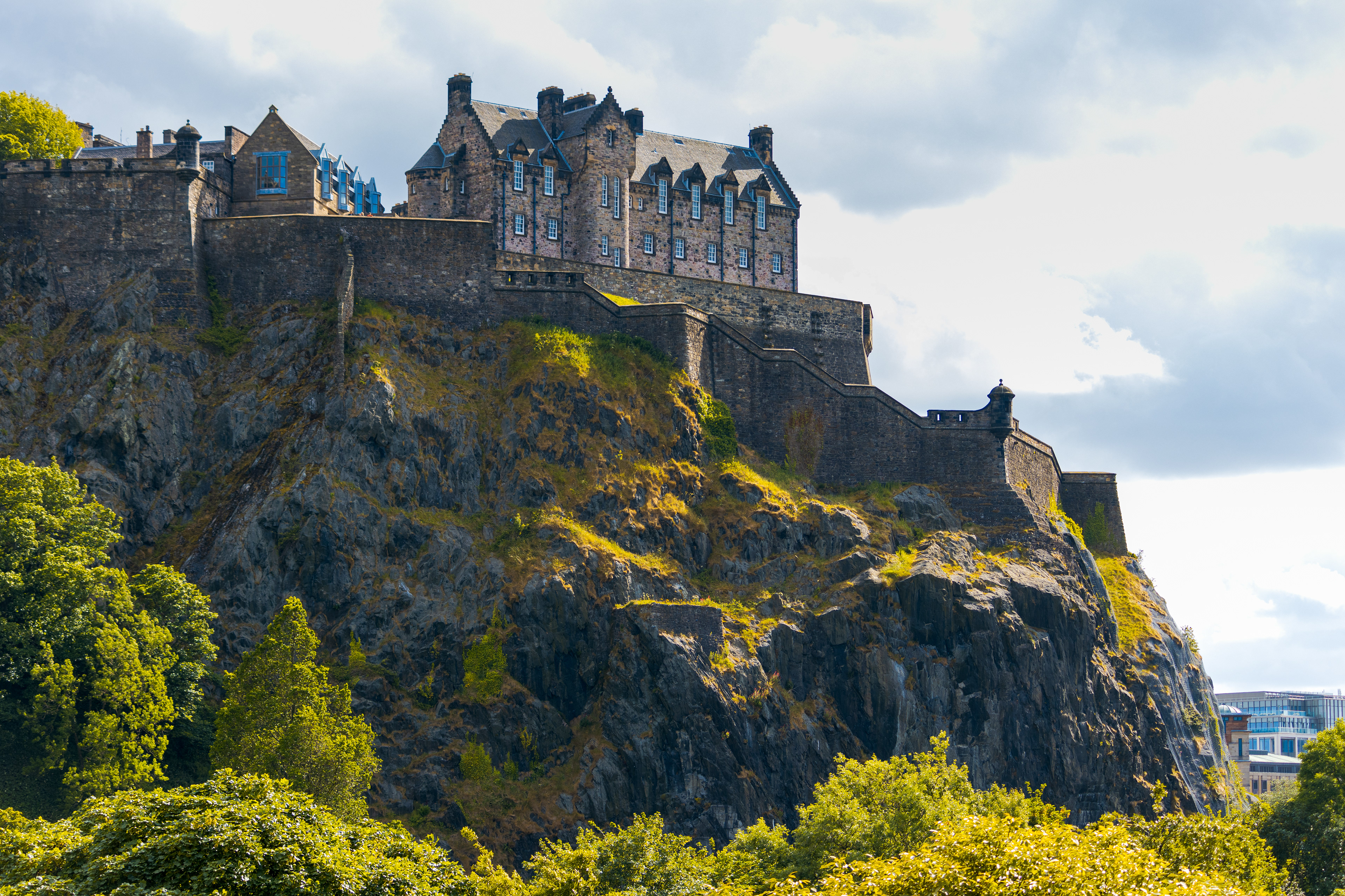 Edinburgh Castle and Castle Rock June 17. Built on top of an extinct volcano overlooking Edinburgh, Scotland, the castle is Scotland’s most-visited paid tourist attraction.