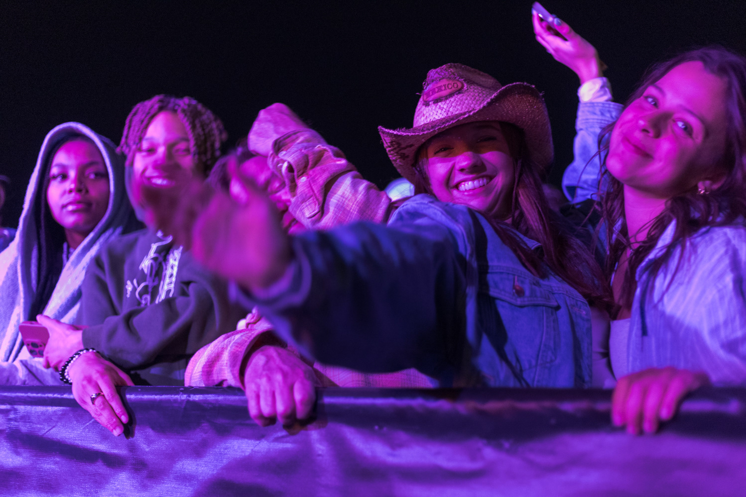 Colorado State University students dance at Friday Night Lights Oct. 13. Part of CSU's homecoming celebration, the event features performances from the marching band, color guard and cheerleaders, as well as speeches from sports coaches, a bonfire, fireworks and a DJ performance.