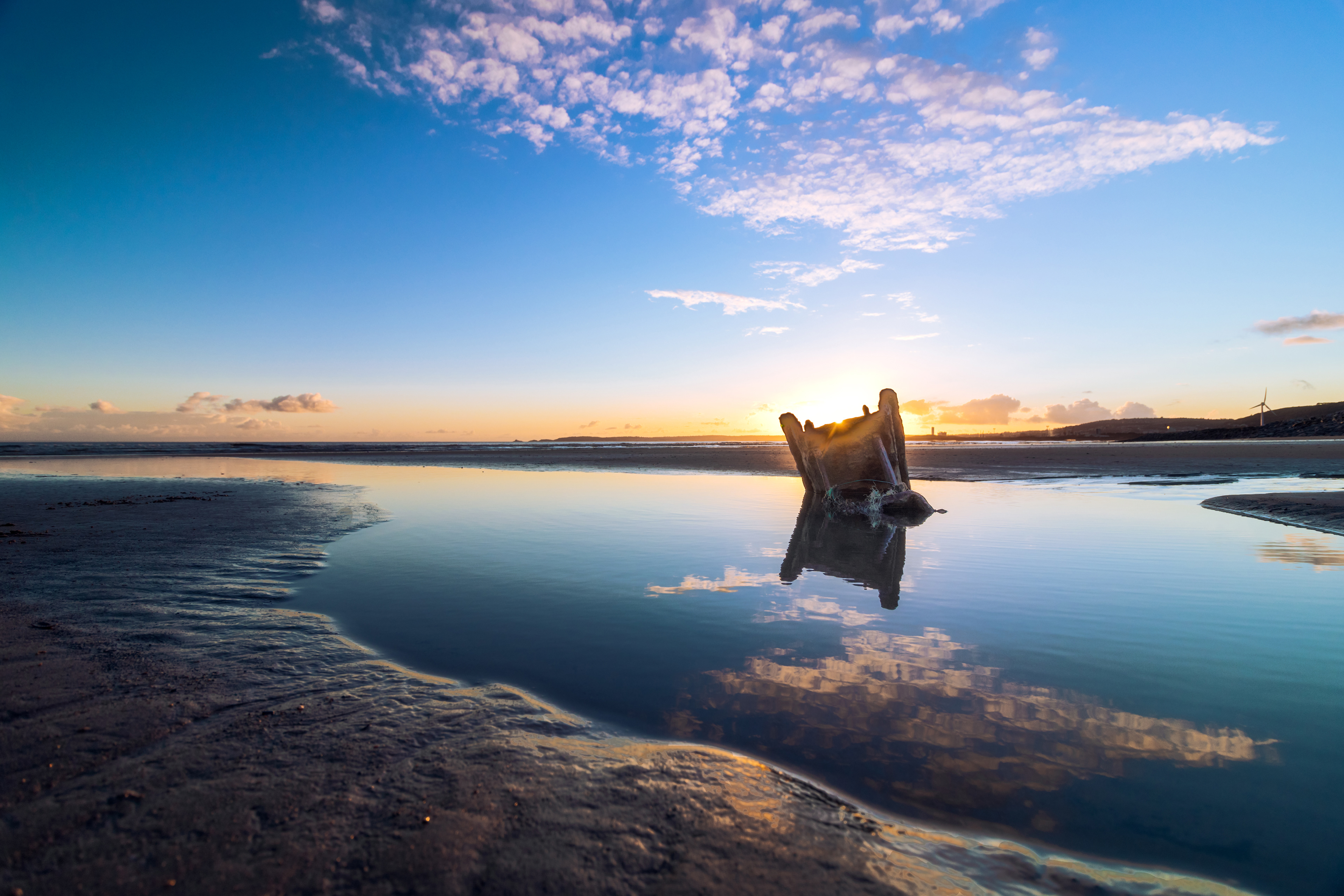 The sun sets on Bay Campus Beach in Swansea, Wales March 4. The Swansea University Bay Campus opened in September 2015 and has direct access to the beach.