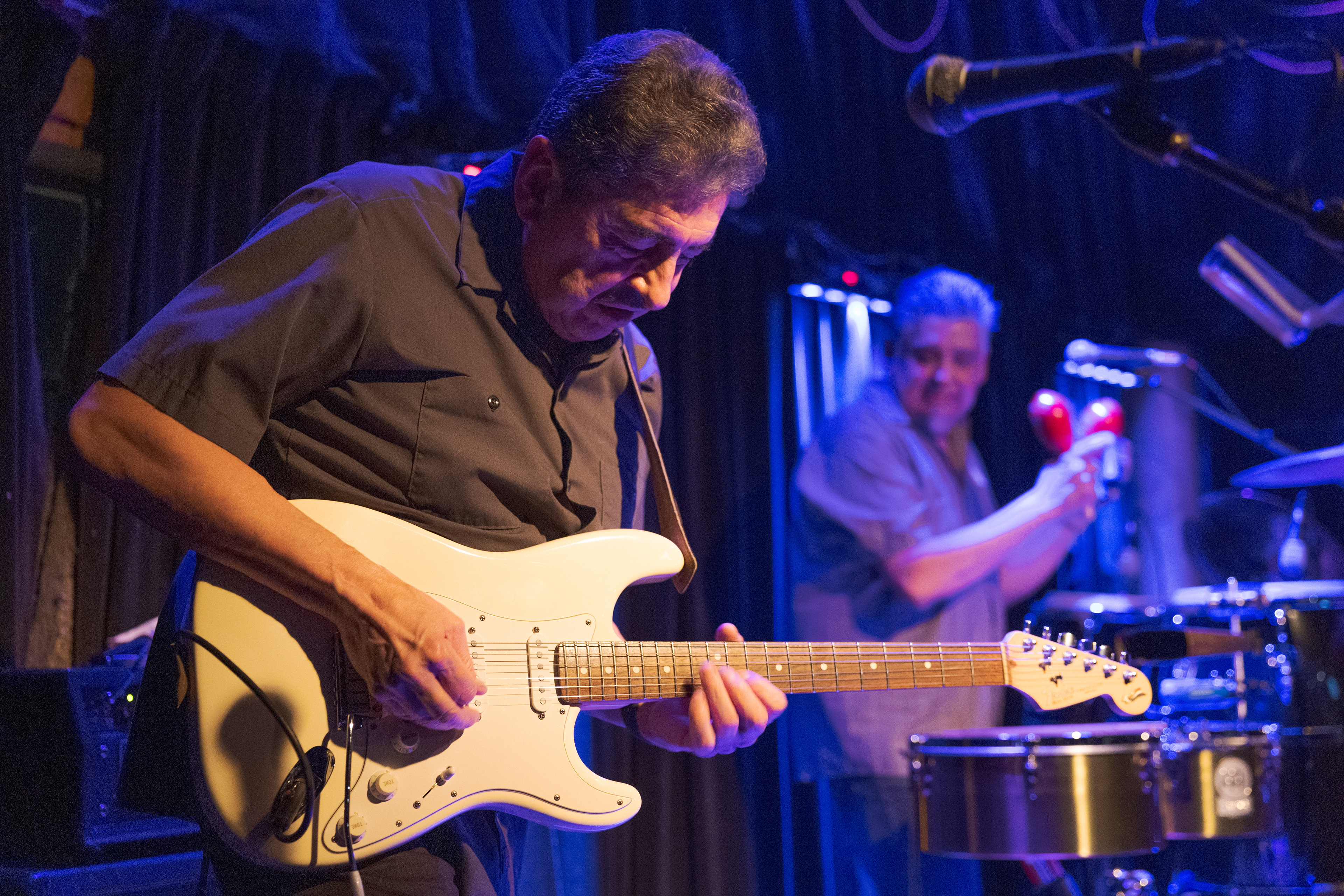 John Jimenez and Frank Jimenez of Fort Collins-based band Persuasion perform "No One to Depend On" at Avogadro's Number Feb. 11. In addition to Persuasion, John Jimenez works as an Information Technology Professional for Colorado State University Athletics, while Frank Jimenez is the co-owner of Babalu's Cuban Cuisine.