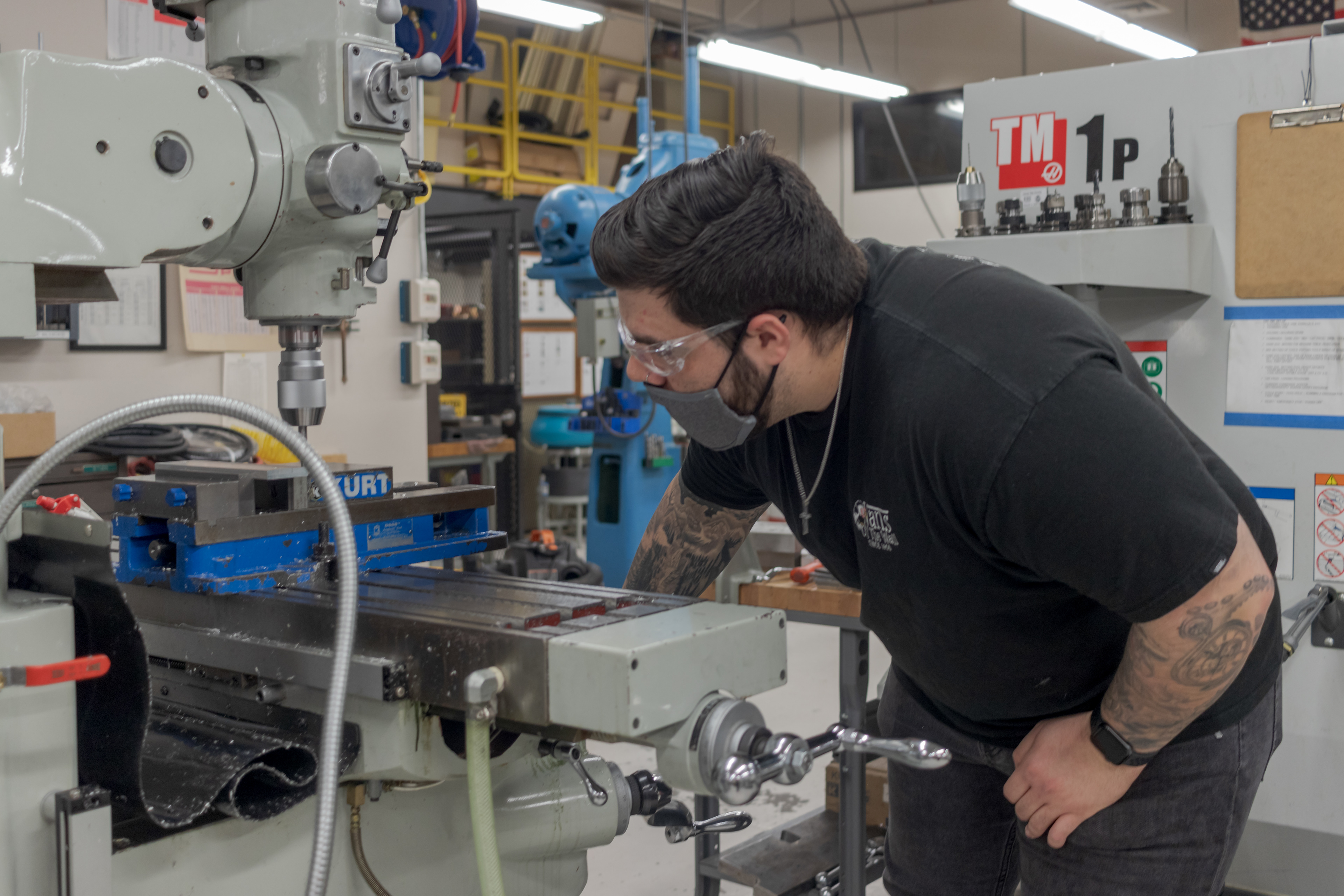 Blake Hill uses an edge finder to calibrate a milling machine in Colorado State University's Engineering Manufacturing Education Center, Mar. 4. 4. Hill says his favorite part of the Introduction to Manufacturing Processes class is "just being able to be in person and come back, and being able to work with my hands instead instead of sitting there with a pen and paper all the time."