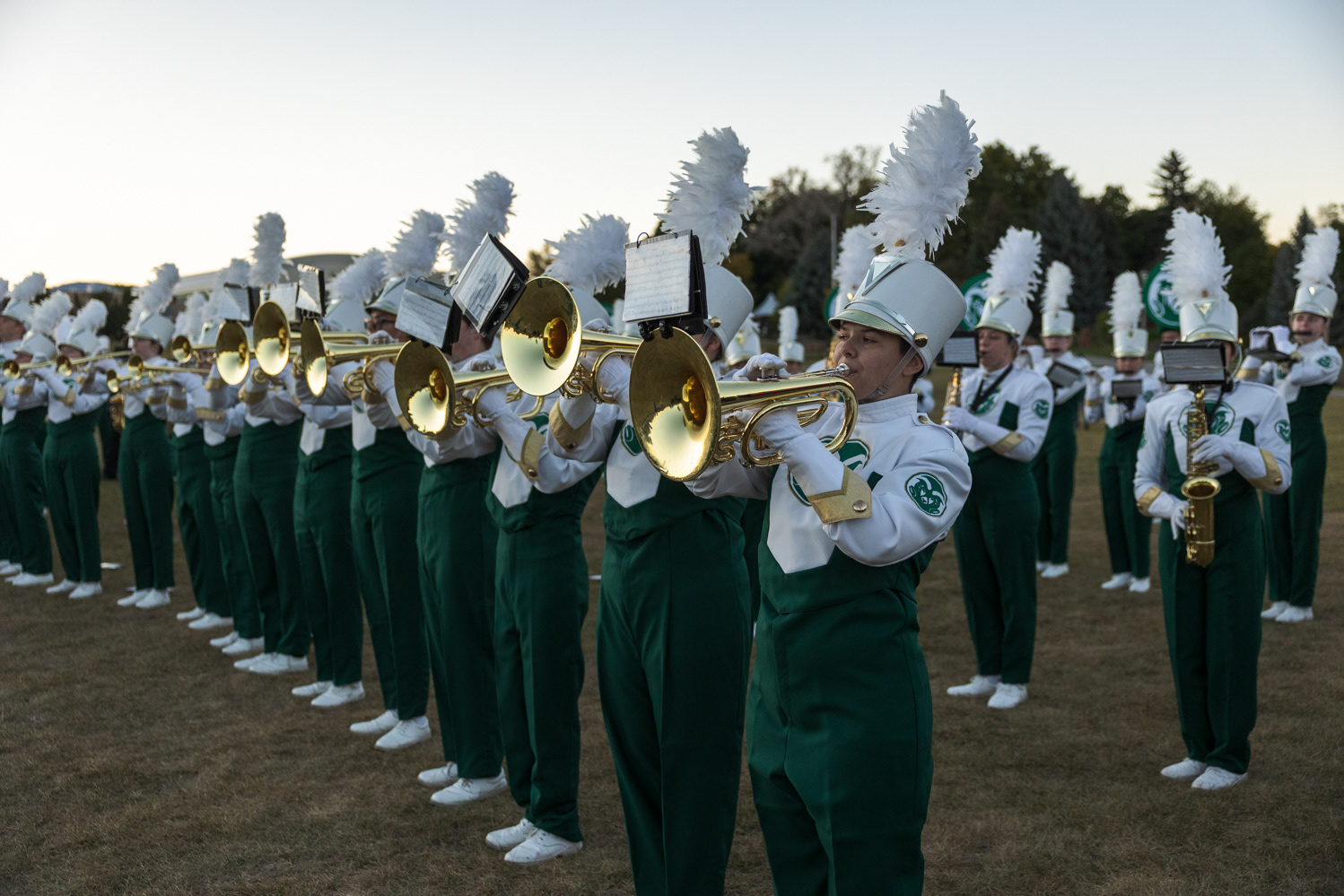 The Colorado State Marching Band performs the CSU Fight Song at Friday Night Lights Oct. 13. Part of CSU's homecoming celebration, the event features performances from the marching band, color guard and cheerleaders, as well as speeches from sports coaches, a bonfire, fireworks and a DJ performance.
