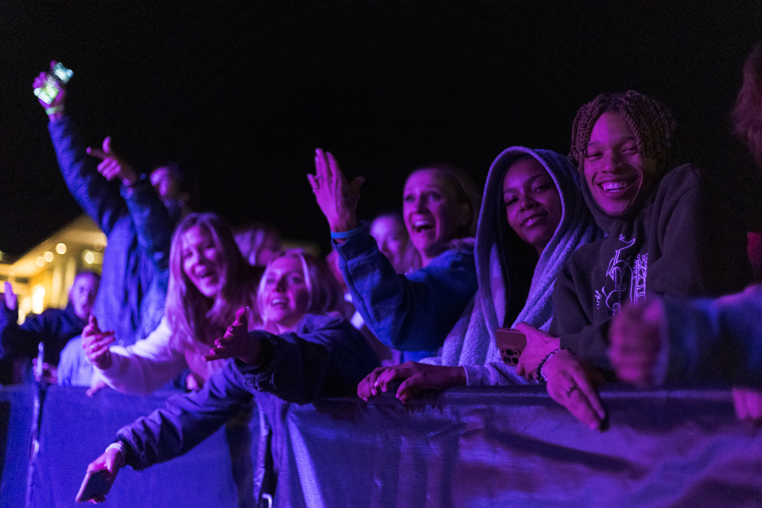Colorado State University students dance at Friday Night Lights Oct. 13. Part of CSU's homecoming celebration, the event features performances from the marching band, color guard and cheerleaders, as well as speeches from sports coaches, a bonfire, fireworks and a DJ performance.