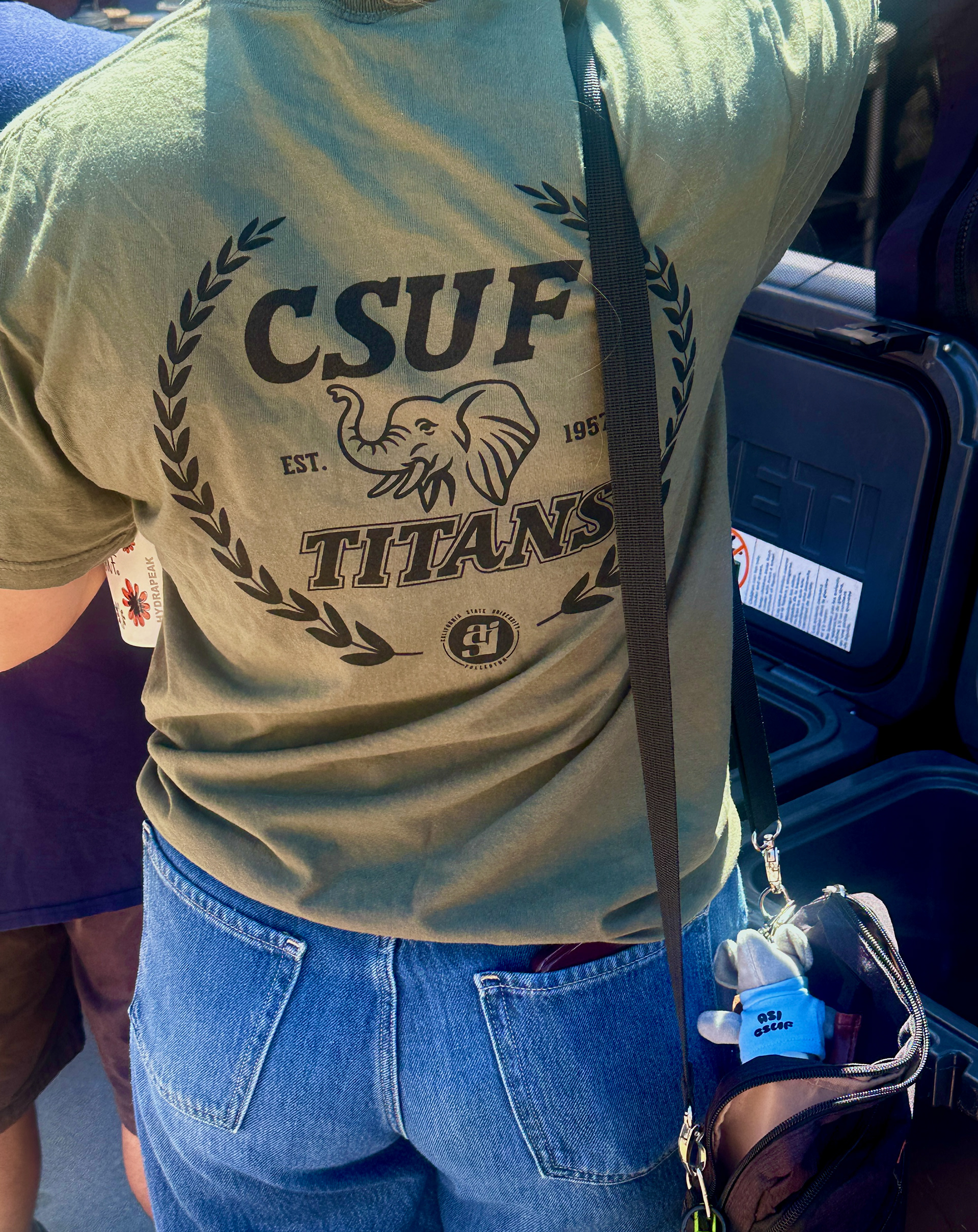 Student wearing T-shirt (ft. elephant t-shirt also designed by me)