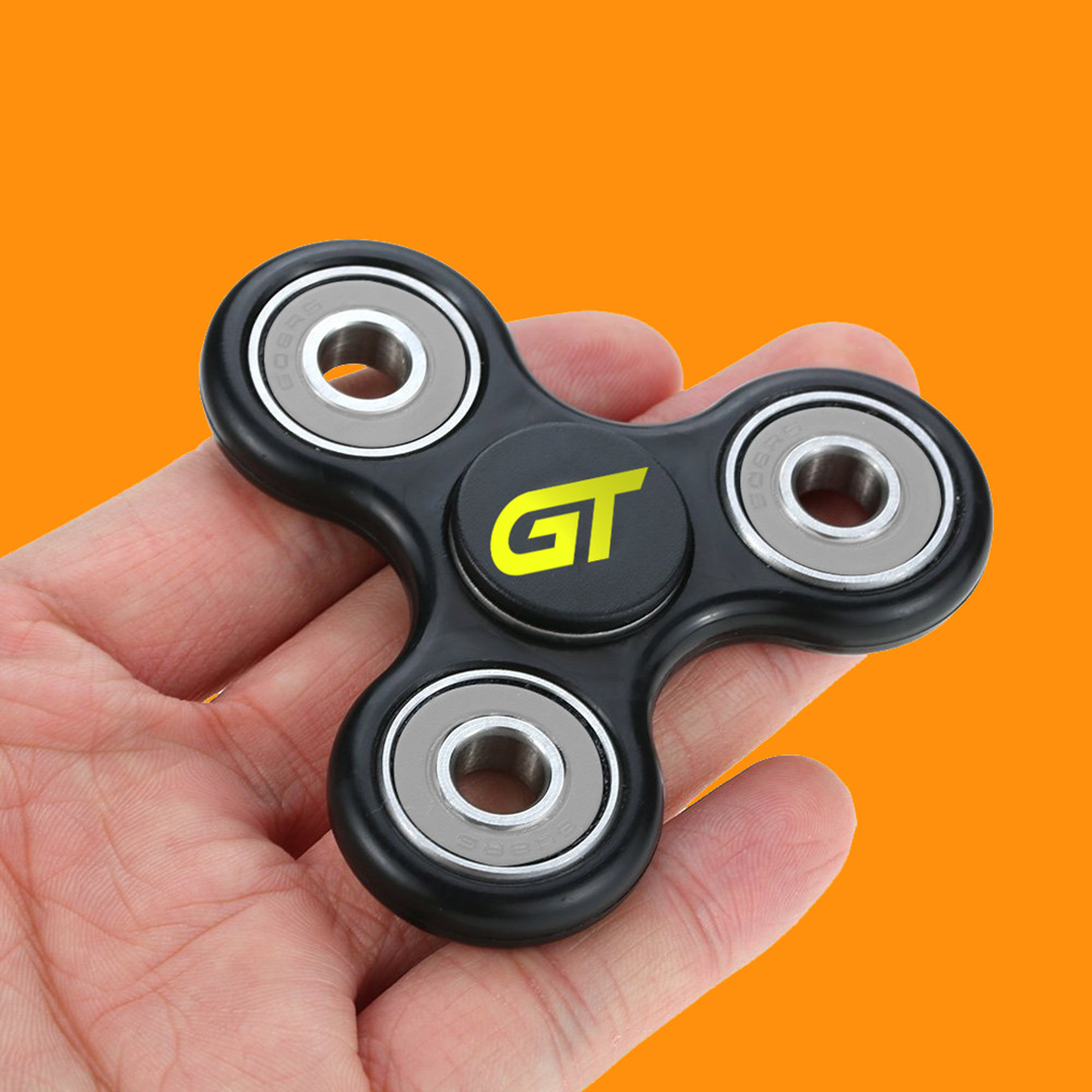 Show promotional fidget spinner. When in motion, the colors of the spinner mimicked the brake rotor when on the vehicle highlighting the black finish against silver.