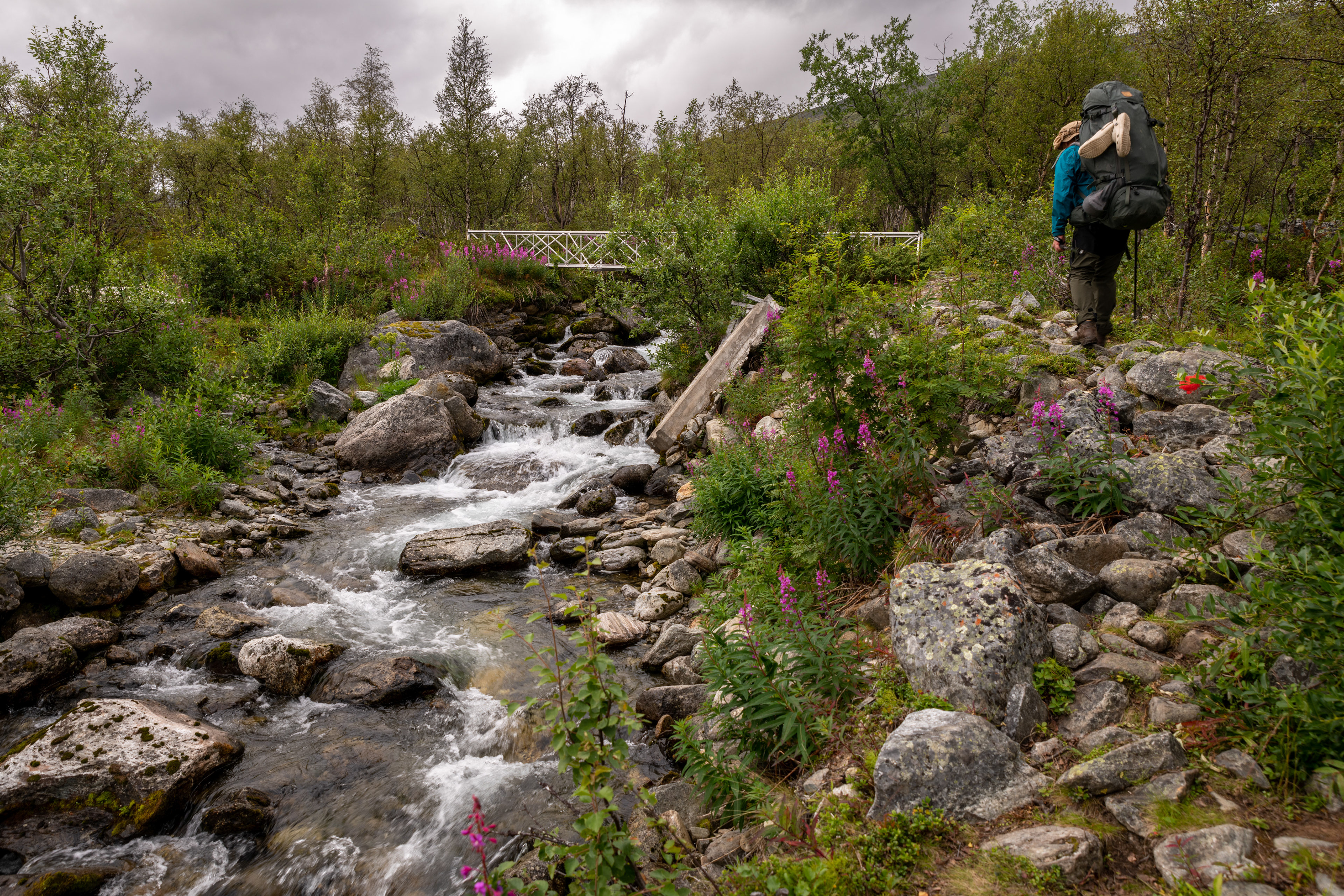 Crossing one of the streasm in Vistasvagge
