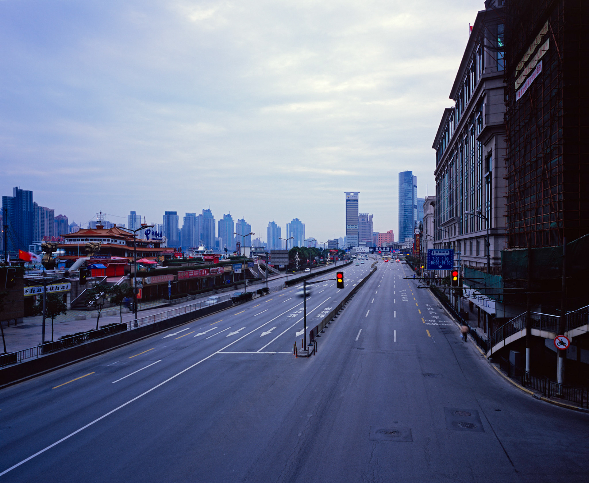 Early morning view looking south along traffic-free, almost deserted Zhongshan Road on an overcast day, The Bund, Shanghai, China