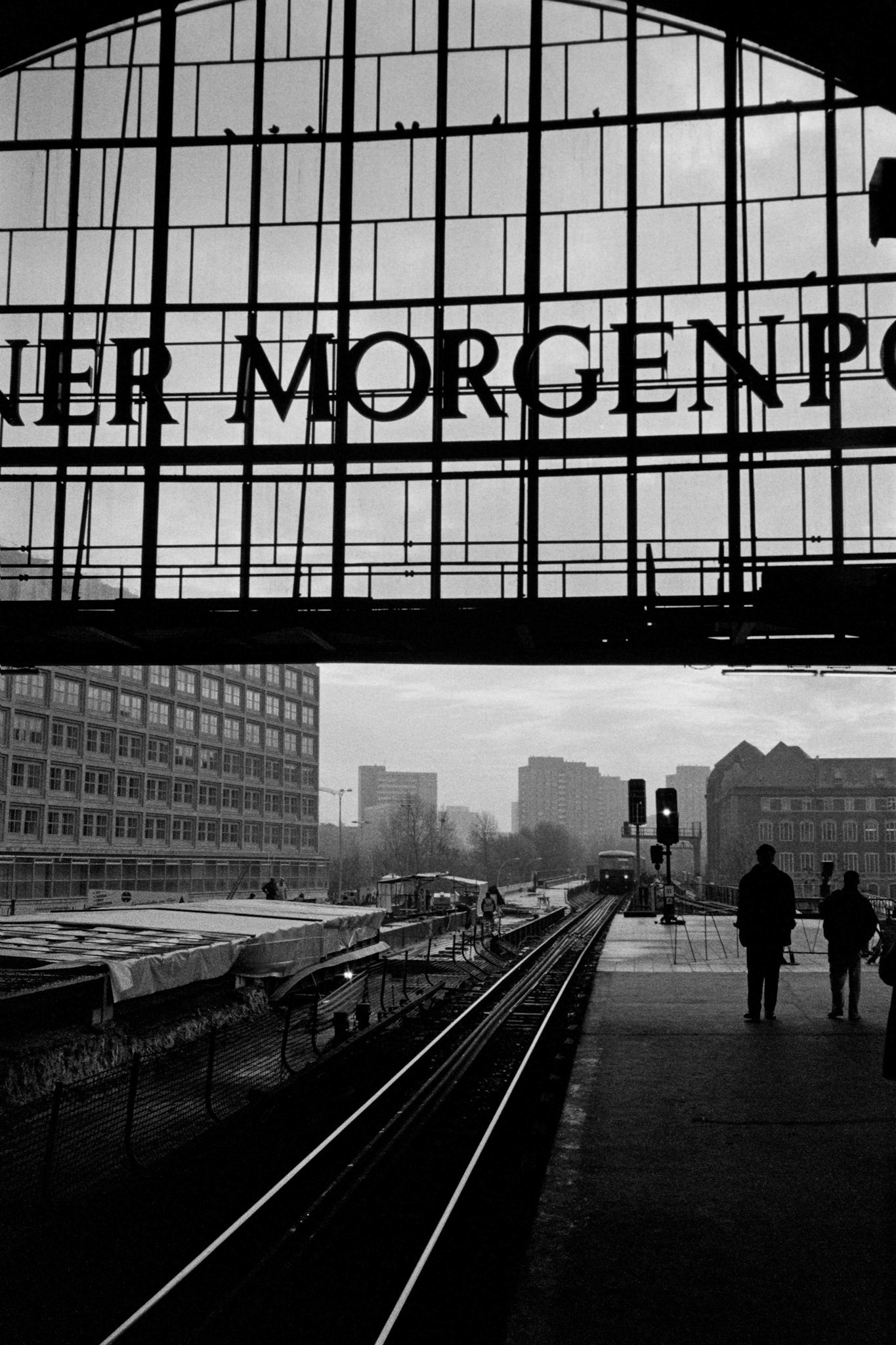 Alexanderplatz train station in the former East Berlin. Photo taken 1996. One of my absolute favourite photos. Just love the texture and everything about it. It was taken on a very very basic and very cheap Canon 35mm compact camera but just looks great. This was the platform that would take me west from Alexanderplatz. I would trot up the stairs just to the left out of shot and wait a few minutes until the next S-Bahn train came along. I clearly remember taking this photo.