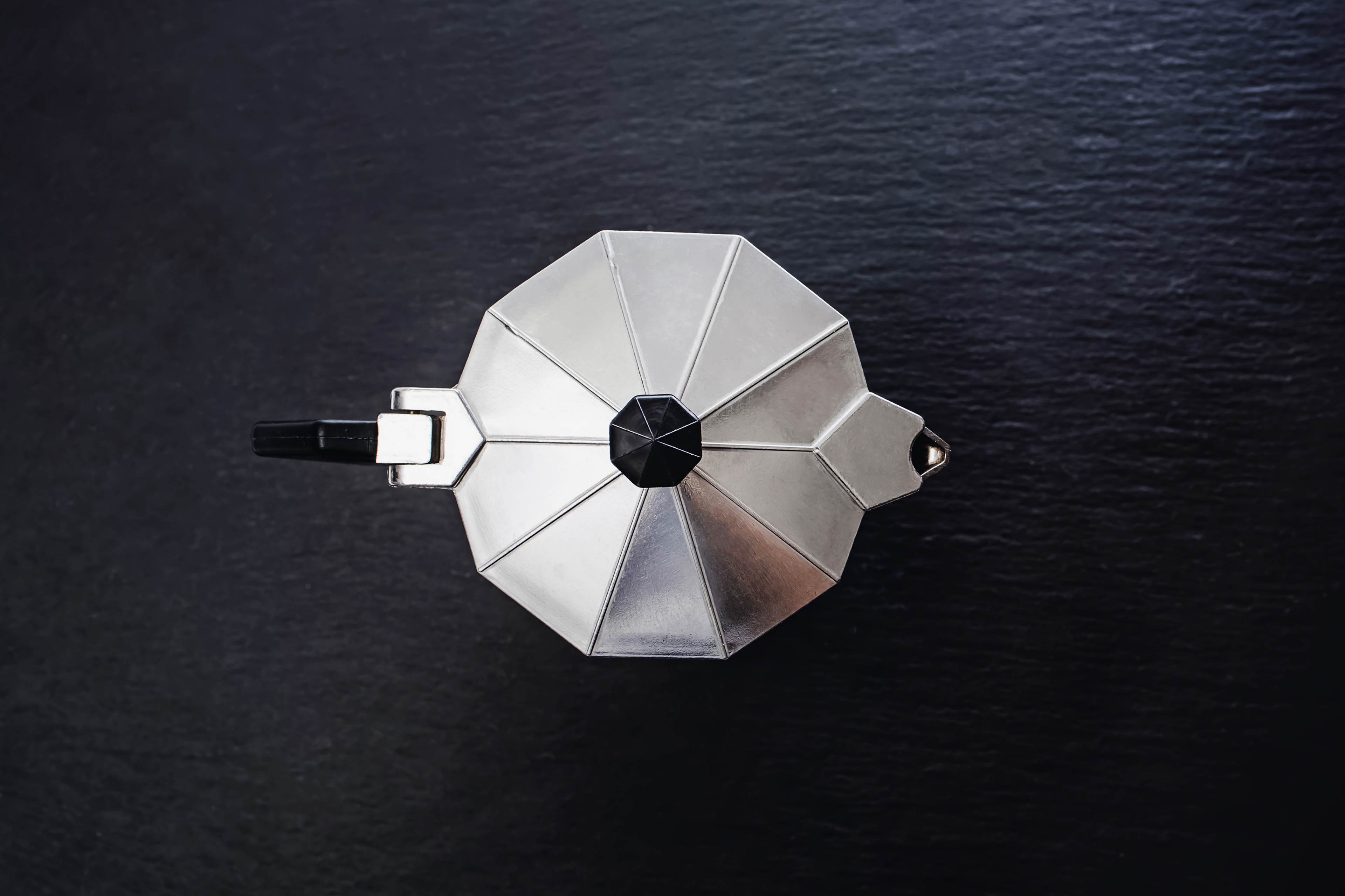 moka pot, dark background