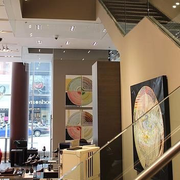 Installation View, Holt Renfrew Men, Toronto. A custom exhibition for the luxury retail environment, demonstrating the work's dialogue with high-end architectural space.