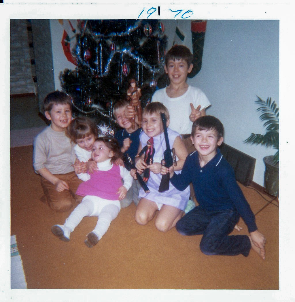 Huculak Cousins 1970 LtoR: Brian, Lee-Ann, Sherri, Wayne, Kelly, Trevor, Ken (back). Children of John Huculak and George (Willis) Huculak. Photo credit: Unknown but likely either  Kathleen [Shewchuk] Huculak or Erika [Borm] Huculak. Scanned photograph posted here as provided courtsey of Kelly [Huculak] Daye (Daughter of George and Ricki Huculak.