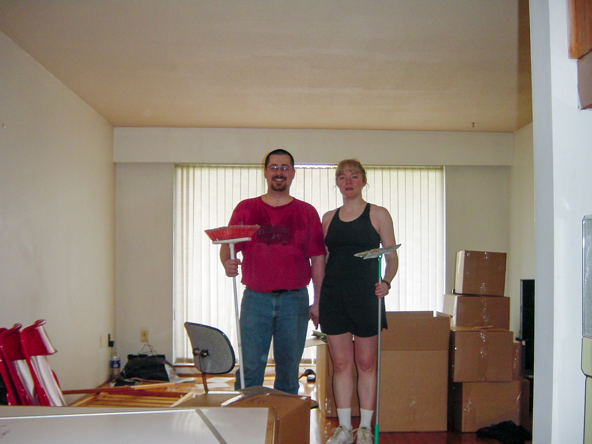 Canadian Gothic: 30 May 2001, Vancouver, BC. Paula Rosson helping Brian Huculak clear out the apartment to make the move to Colorado. Photo credit: Brian Huculak