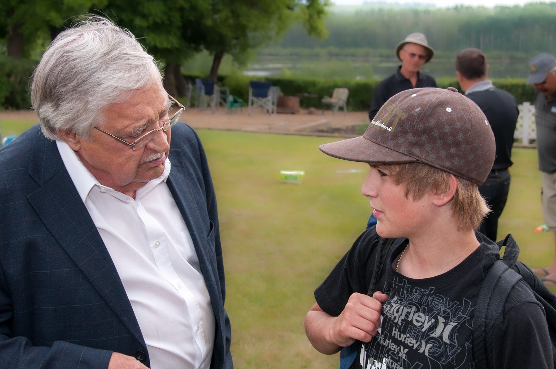 04 July 2009: Generations: Stefan (Steve M) Shewchuk with his grandson Jake. Photo credit: Brian M Huculak.  Location: Mike M Shewchuk homestead northeast of Willingdon, AB (now family farm of grandson Gerry Tatarin and Myrna [Olynik] Tatarin.)