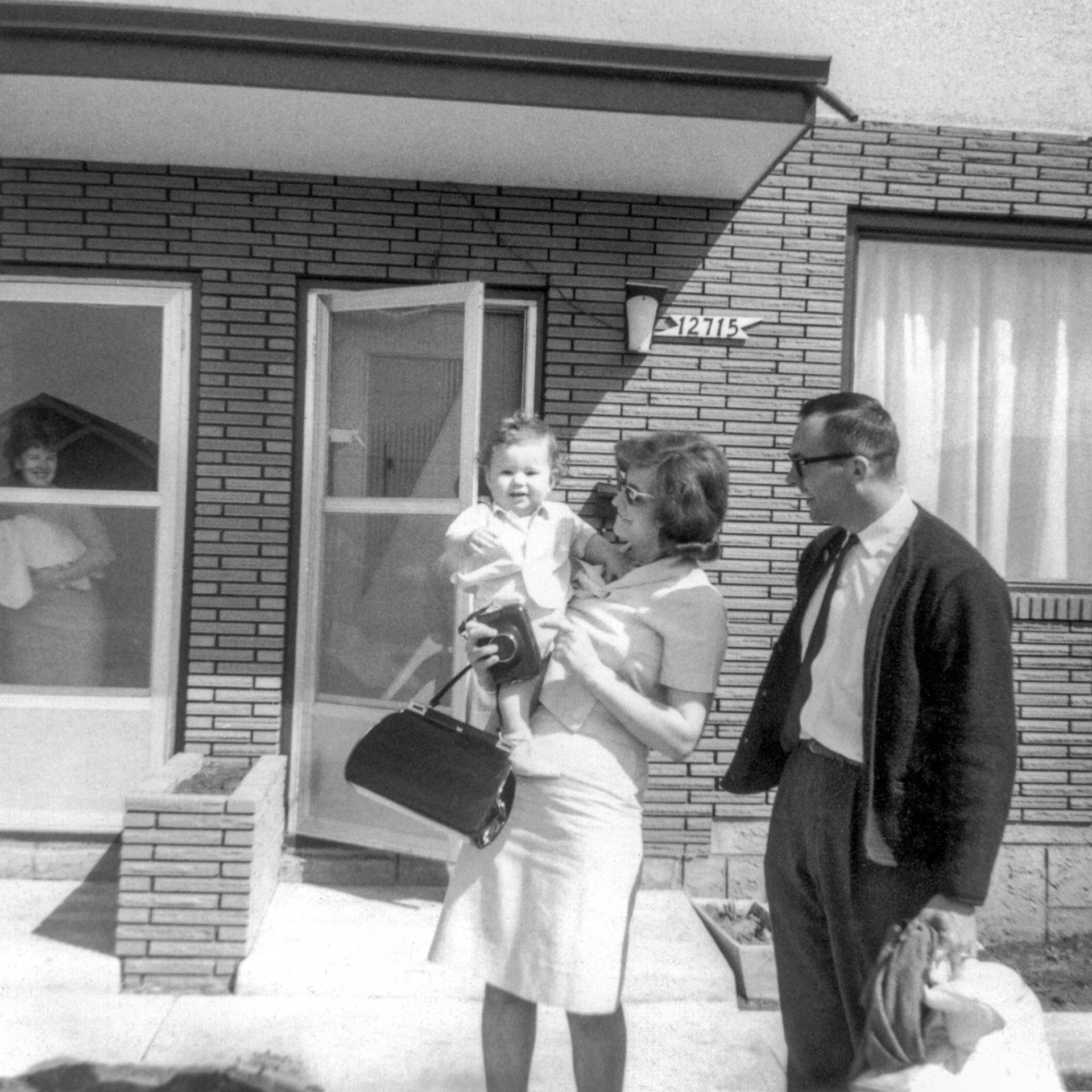 May 1965: Brian Huculak (1 year old) Parents Kathleen [Shewchuk] Huculak and John. In the adjacent doorway, sister-in-law Ricki Huculak. Photo credit: Lorna Stefaniuk.