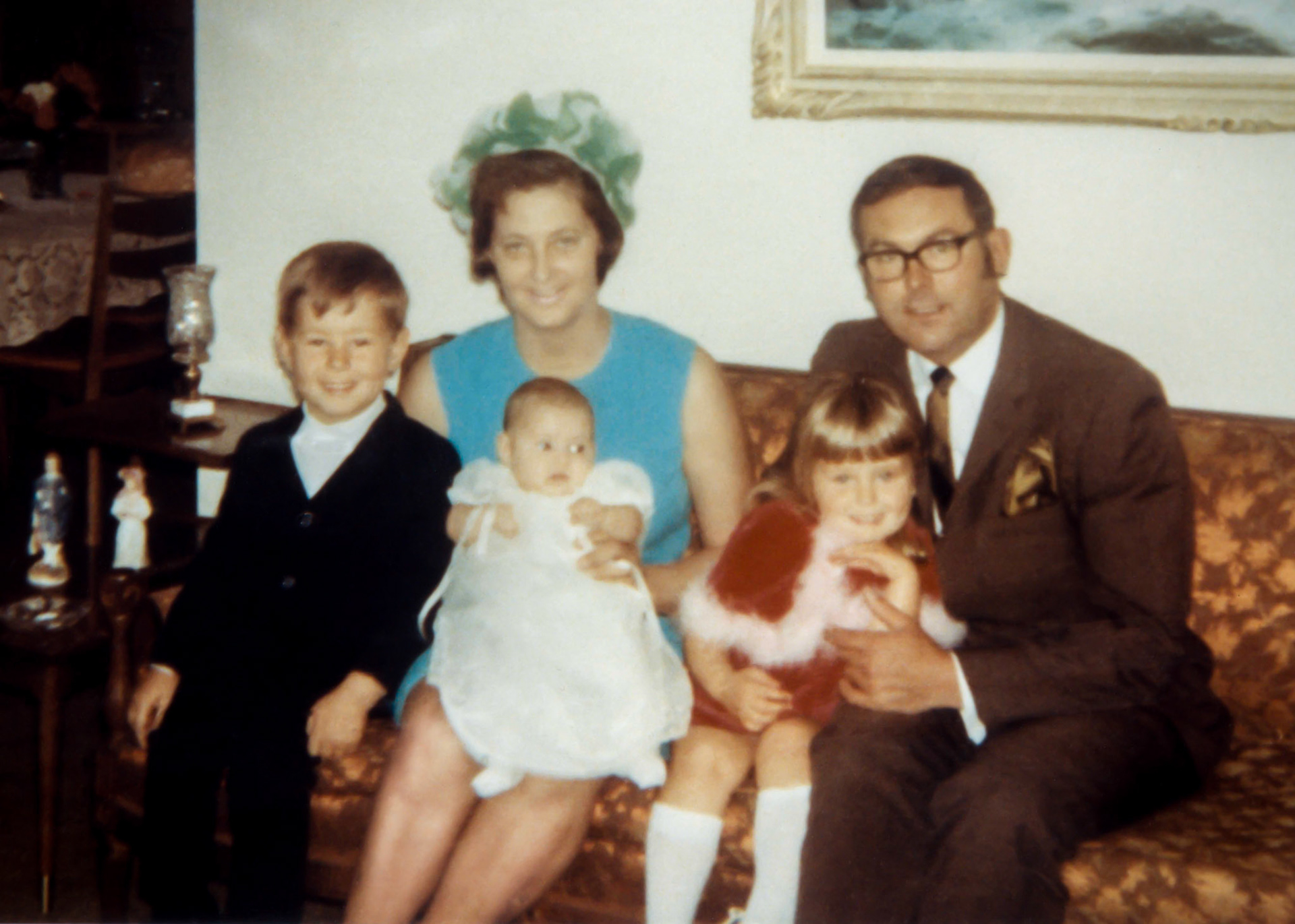 July 1969 • Huculak family L to R: Brian (5) - Kathleen [Shewchuk] Huculak (35) - Sherri (3mths) - Lee-Ann (3) - John Huculak (36), family home in Edmonton, AB. Photo credit unknown. Likely family or friends of John and Kathleen