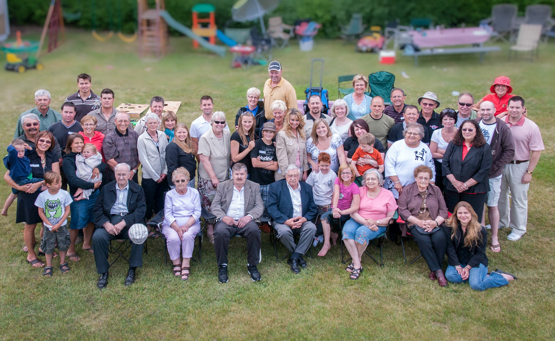 04 July 2009 • Shewchuk reunion at the Mike and Christina Shewchuk homestead - currently owed and operatred by grandson Gerry Tatarin and Myrna [Olynik] Tatarin (standing far left).  Front row L to R: Metro Romanko - Eleanor [Shewchuk] Romanko - Paul Shewchuk (Linda [Johnson] Shewchuk behind) - Steve Shewchuk - Kathleen [Shewchuk] Huculak - Nettie [Shewchuk] Megley. Photo credit: Brian M Huculak
