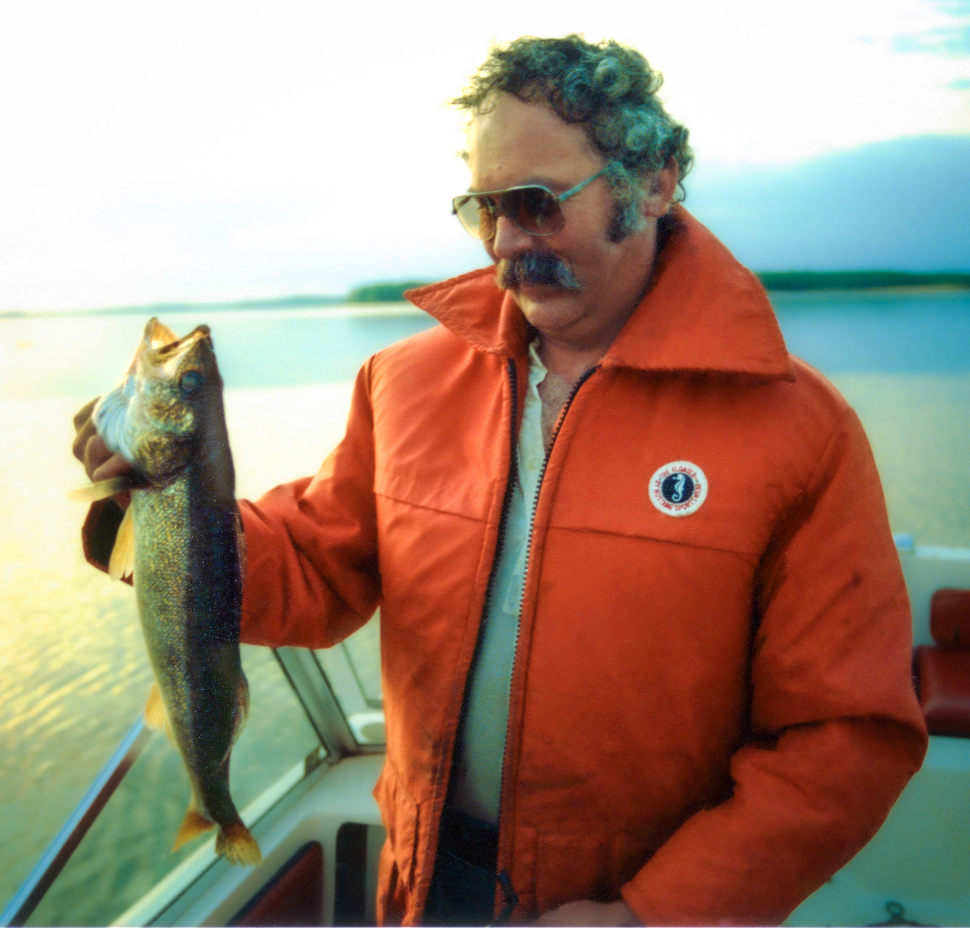 Circa 1984 • John Huculak (51) lands a big one on Beaver Lake, Lac-La-Biche, AB. Photo credit: Brian Huculak