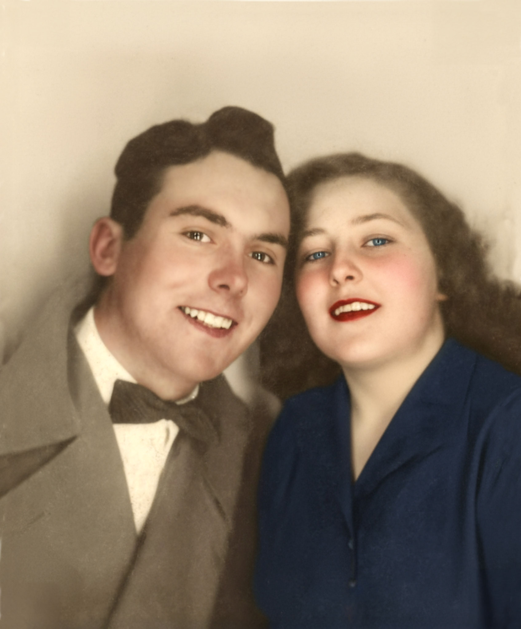 Circa 1953 • Photobooth image of John Huculak and Kathleen [Shewchuk] Huculak. Photo restoration from monochrome image (BW) by Brian M Huculak (AI assisted for coloriziation)