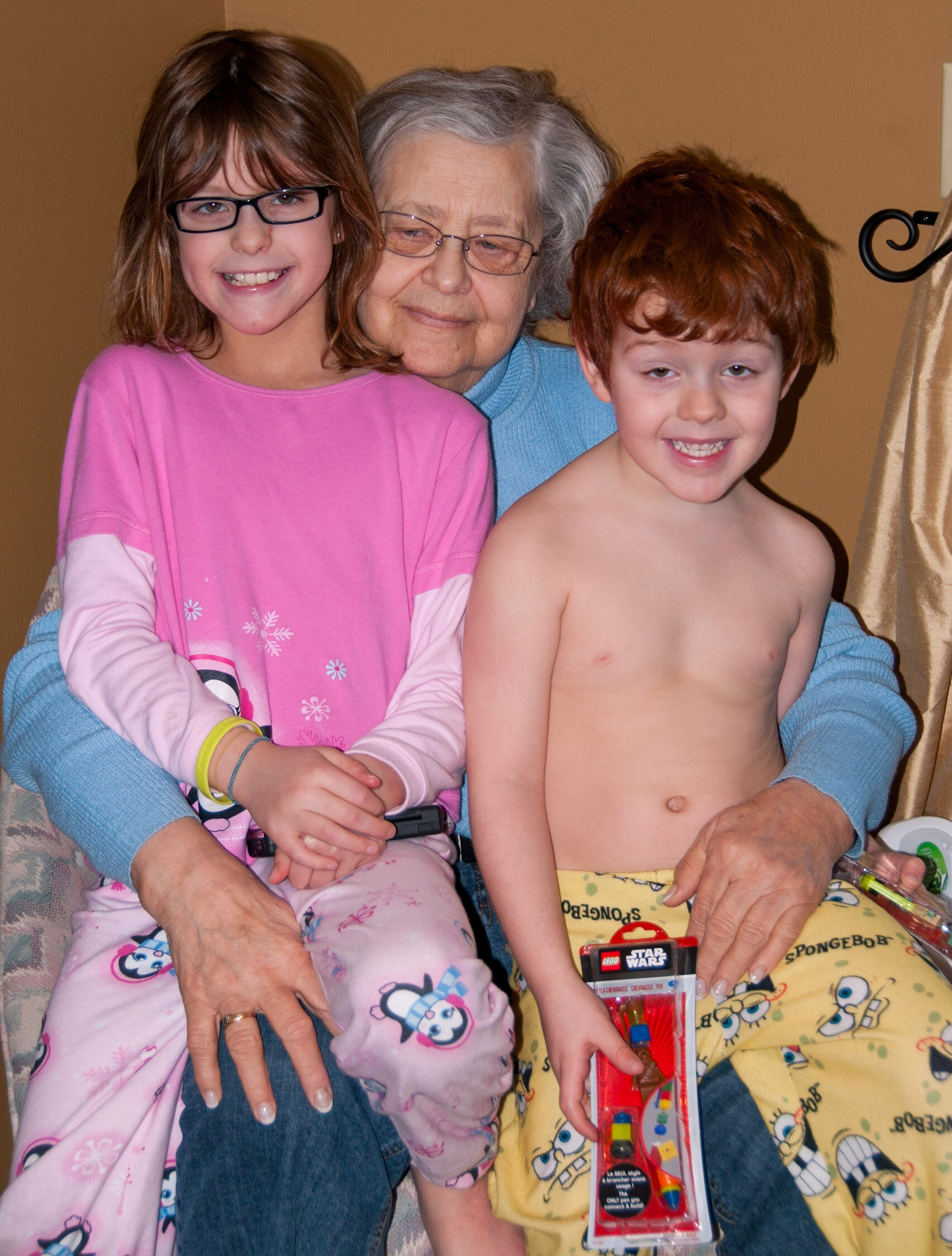 24 Dec 2007: Kathleen [Shewchuk] Huculak with grand children of Lee-Ann [Huculak] and Barry Emment. LtoR: Alesia Emment, Kathleen Huculak, Garreth Emment. Calgary, Alberta. Photo credit: Brian M Huculak