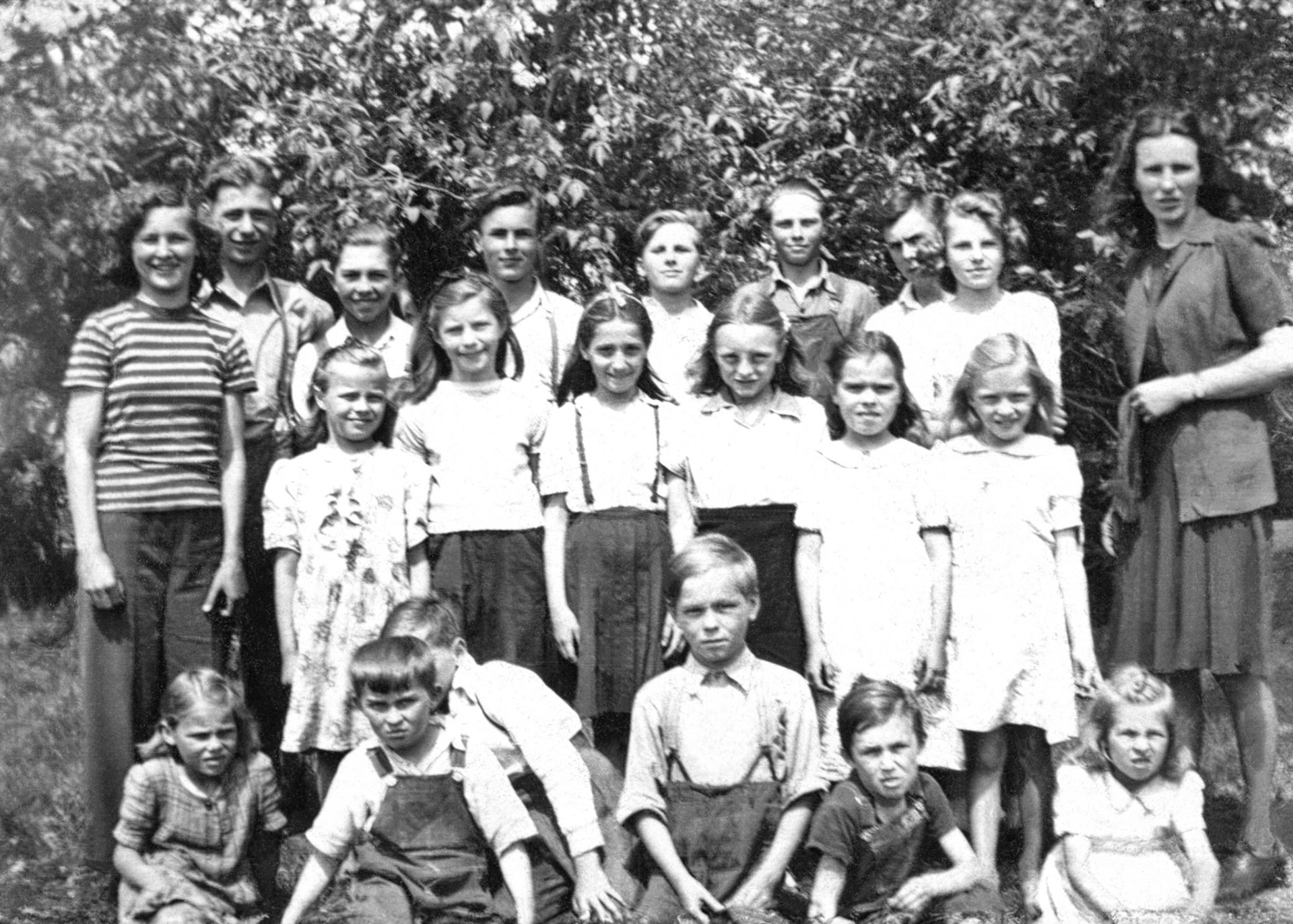 Circa 1948: Boyan School Photo: Backrow, third male from left: George (Willis) Huculak. First male from right peeking out from behing female: John Huculak (brothers). See related hand written list of names for thie group shot