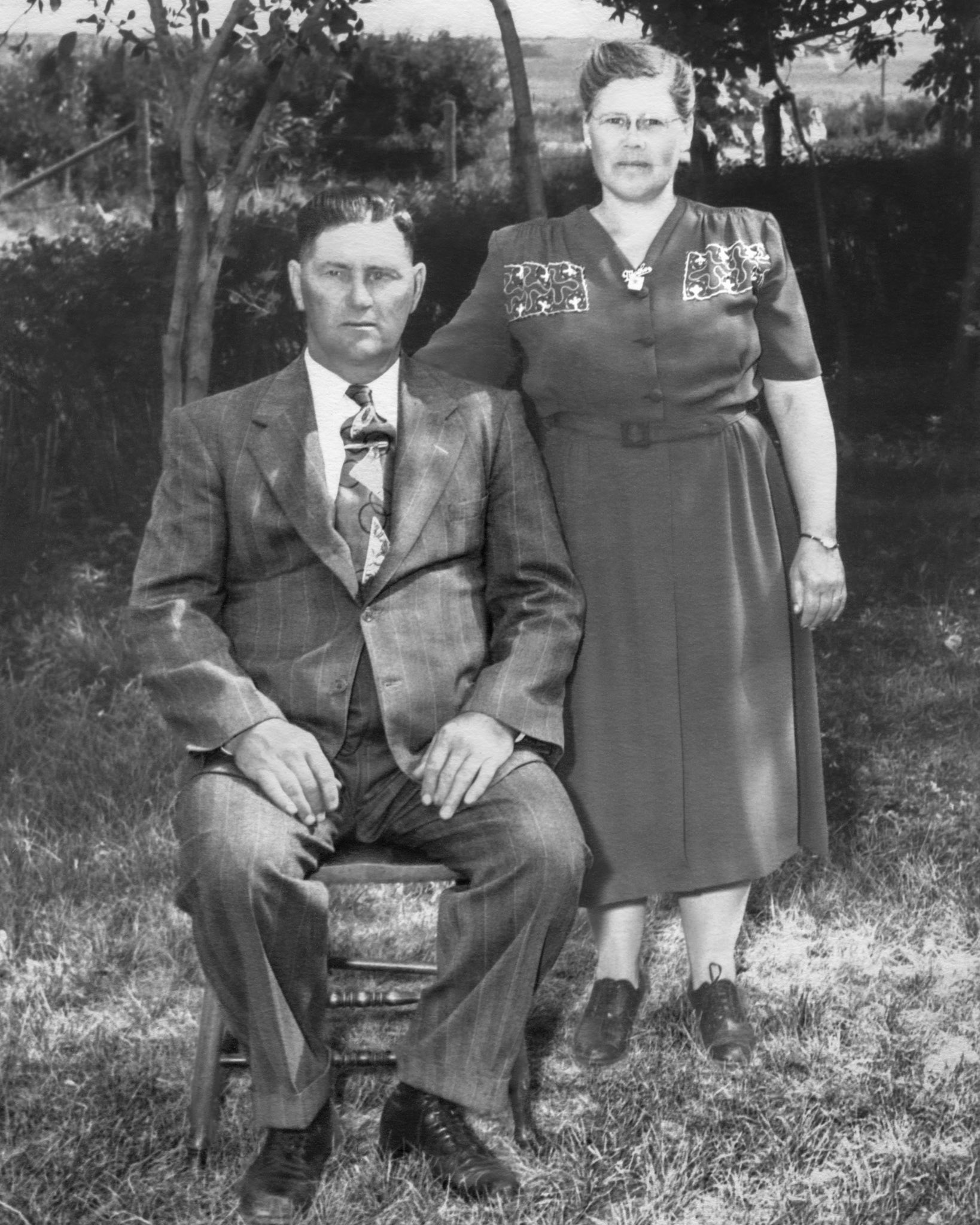 c.1950: Mike Shewchuk and Christima [Huculak] Shewchuk on family farm near WIllingdon, AB