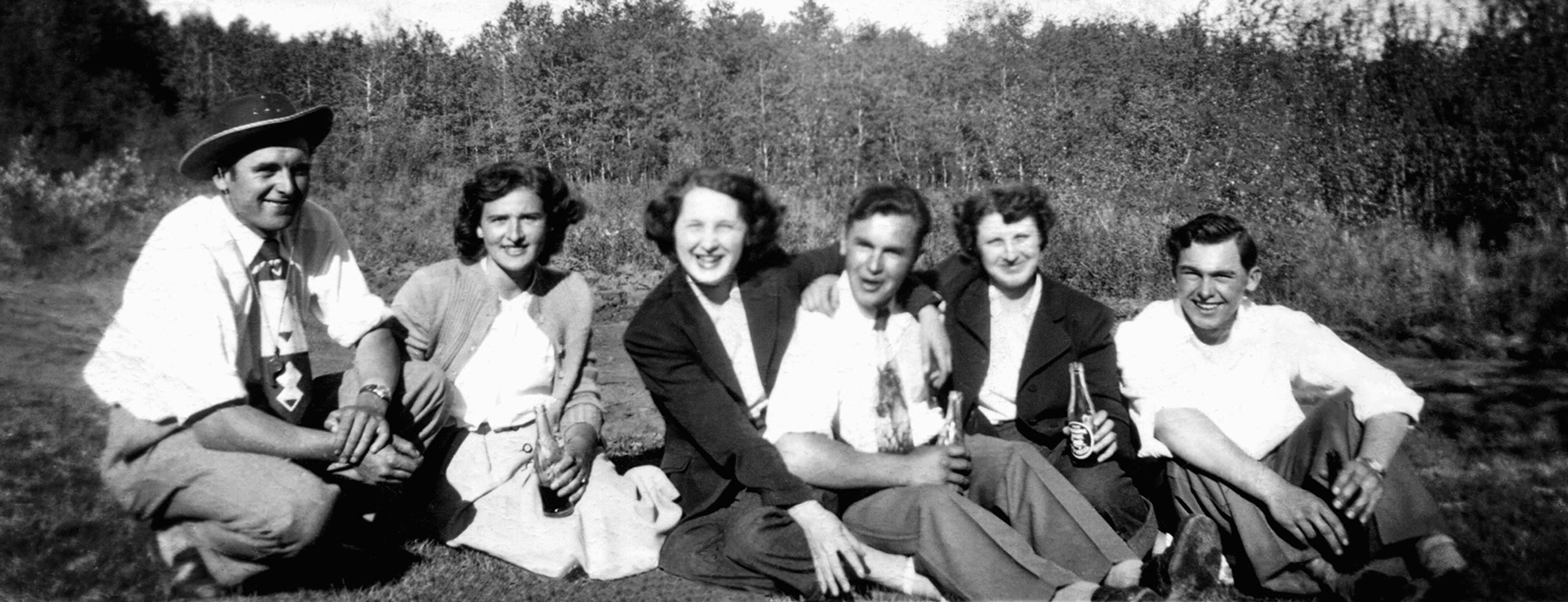 Circa 1950: L to R: Uknown Male, Unknown woman, Anne Meskaniuk, George Huculak, Katie Porulek, John Huculak (The Huculak Brothers). Taken on the Huculak family farm northewest of Willingdon, AB.