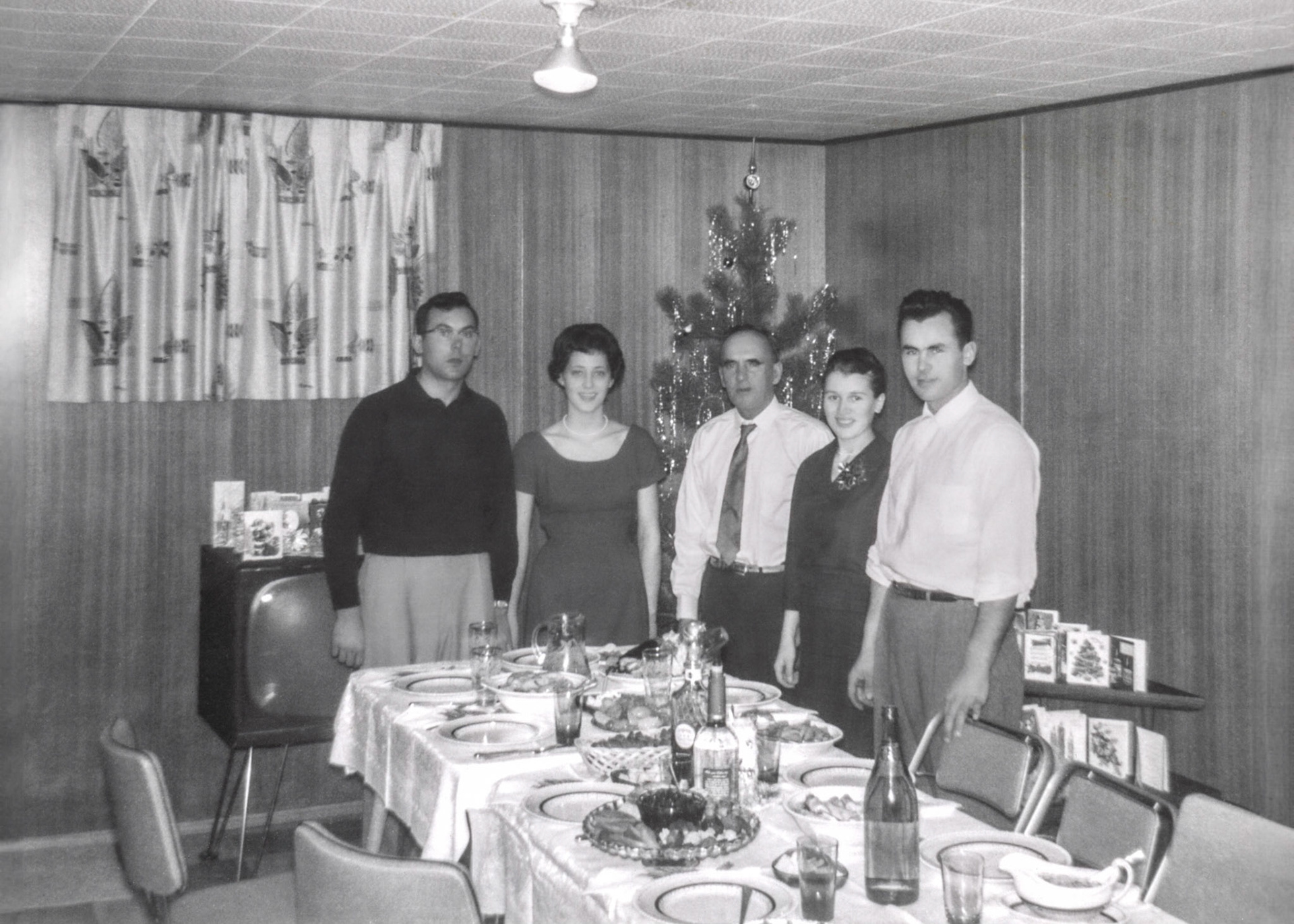 Christmas 1960 •  The Huculak family, L to R: John Huculak and wife Kathleen [Shewchuk] Huculak - father John Huculak SR - Ricki (Erika) [Brom] Huculak with husband George (Willis) Huculak. Likely Edmonton, AB.
