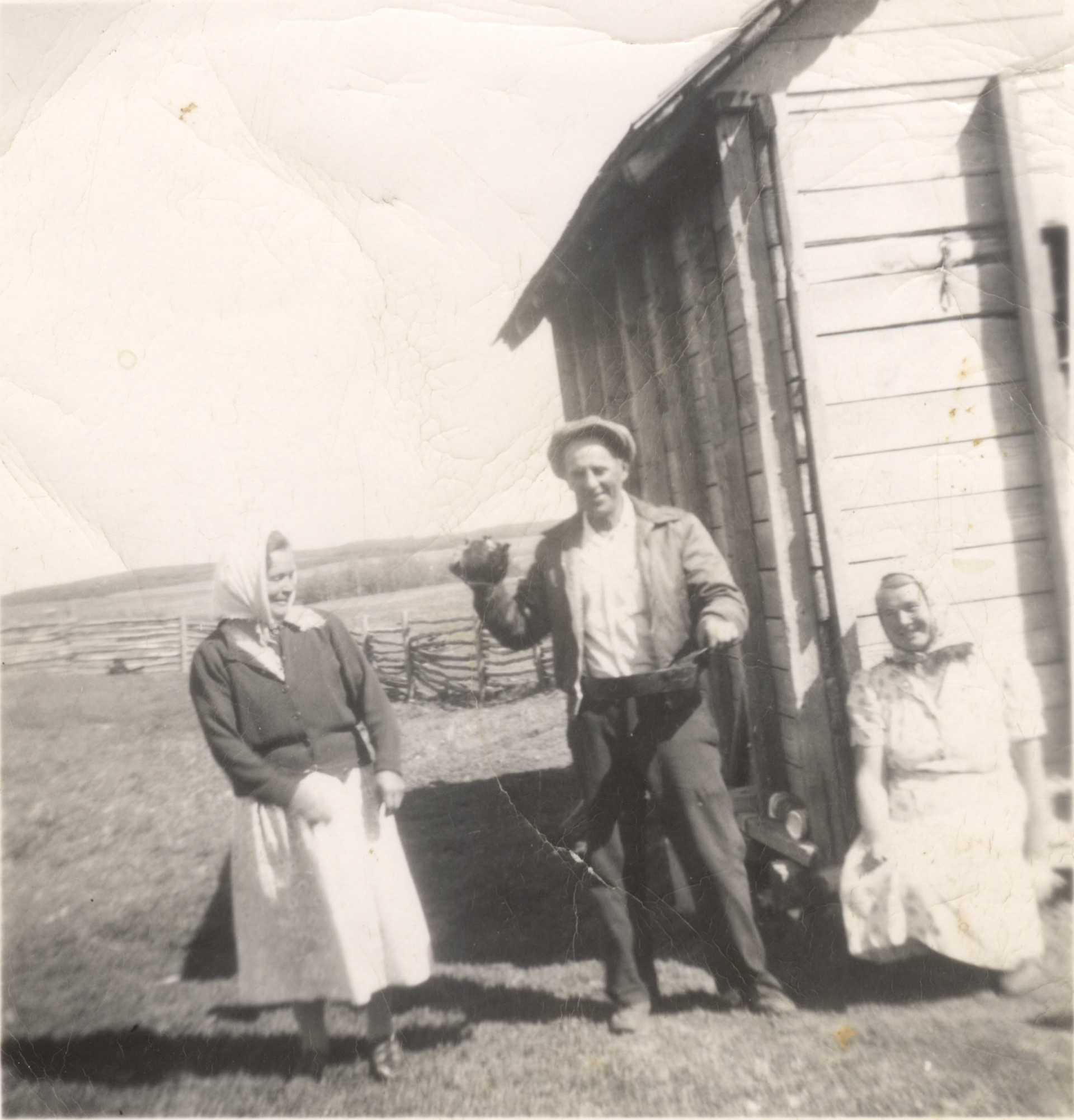 BEFORE: Circa 1935: L to R: Unknown female - John Huculak SR - Annie [Darda] Huculak. See After image for comparison