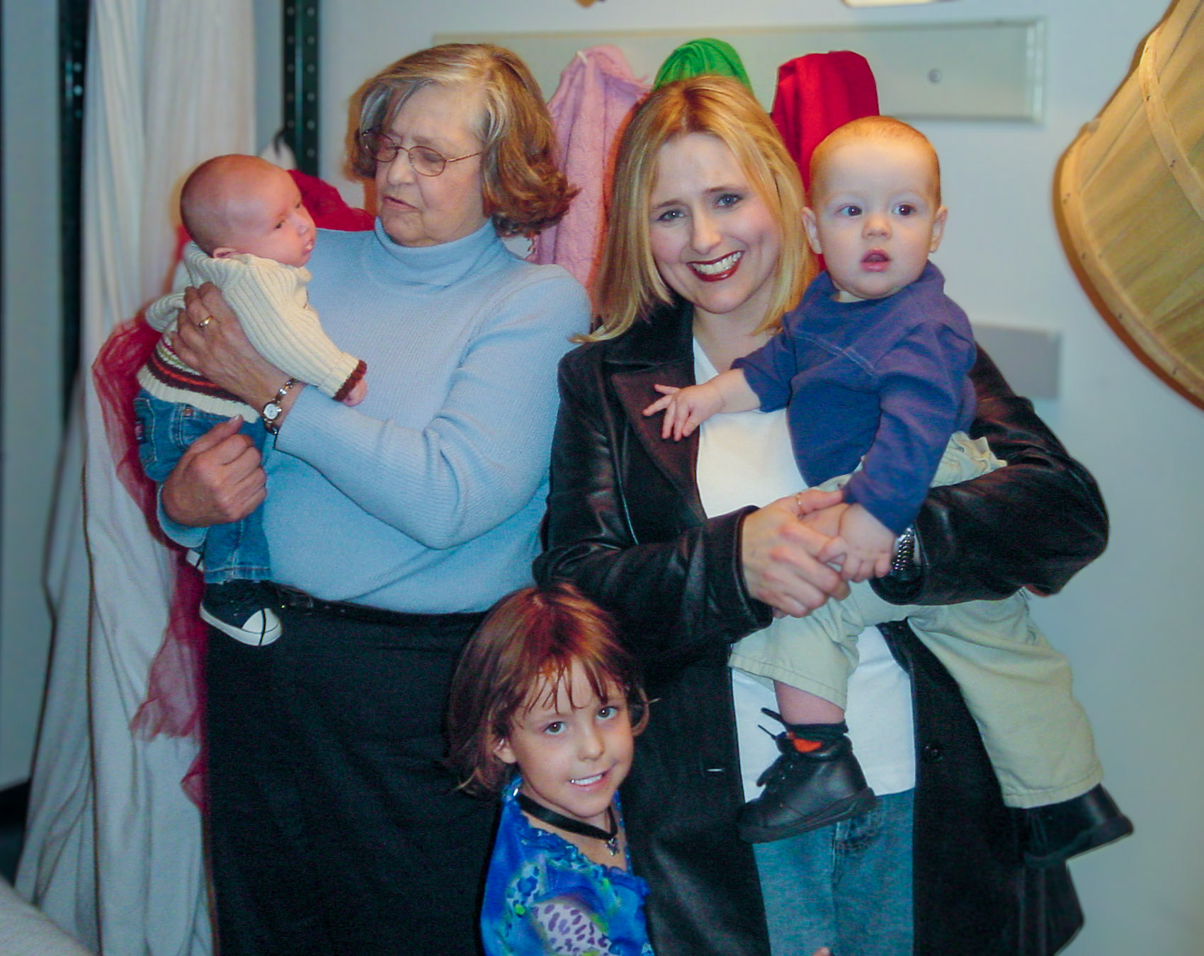 17 Jan 2003 • Edmonton, Alberta. L to R: infant Ben Macki (3 mths), grandmother Kathleen [Shewhcuk] Huculak (69) and mother to Lee-Ann [Huculak] Emment (37) with children Garreth (9 mths) and Alisa Emment (6). Photo credit: Brian Huclak (uncle)