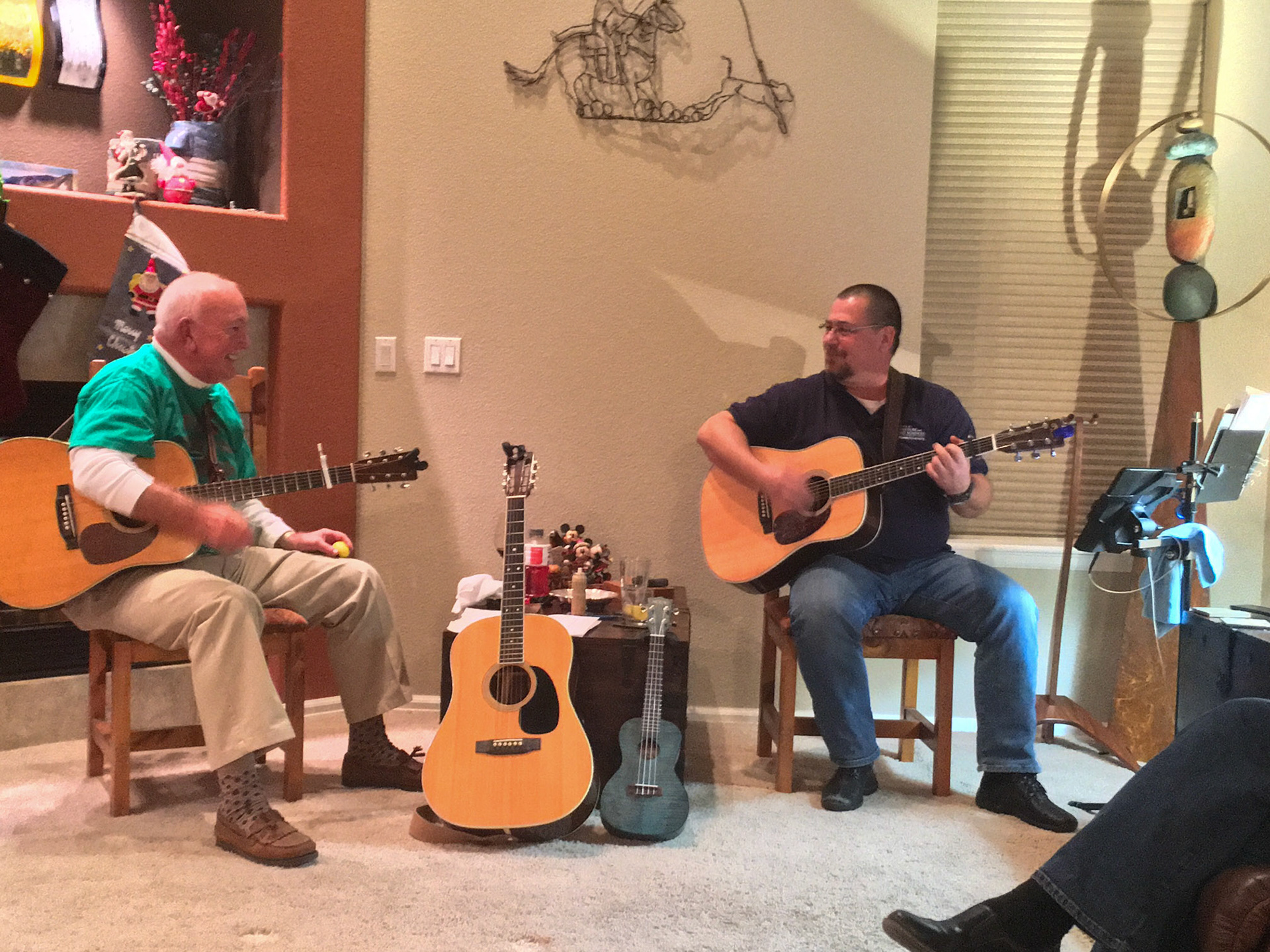 25 Nov 2015: Dan Rosson (left) - Brian Huculak at a home concert in Arvada, Colorado. Dan Ludwin left. John Kearns out of frame left also playing at the event. Photo credit: Paula Rosson