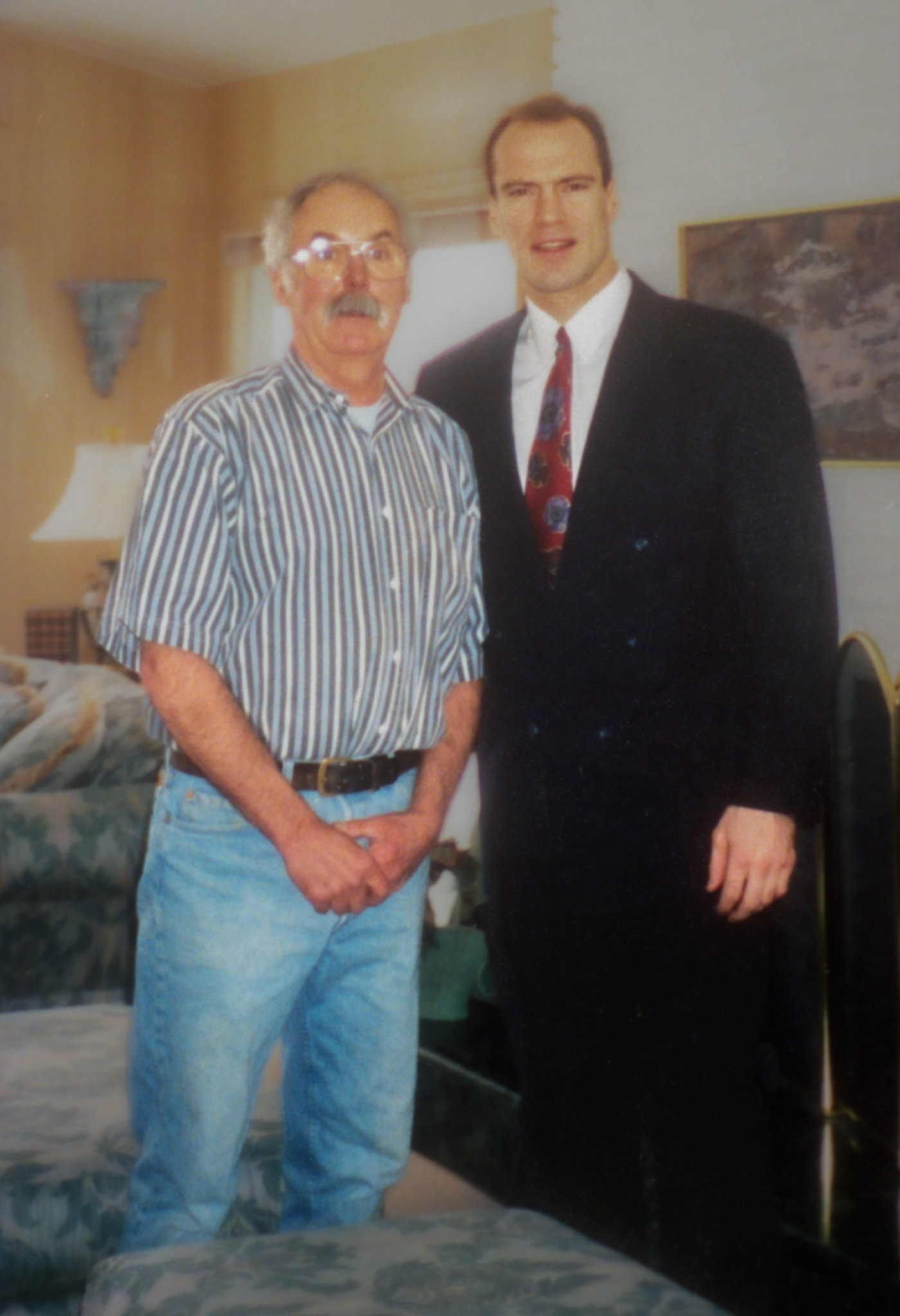 Circa 1995: John Huculak with Mark Messier (Edmonton Oilers, NHL) at Messier home, Edmonton, AB.