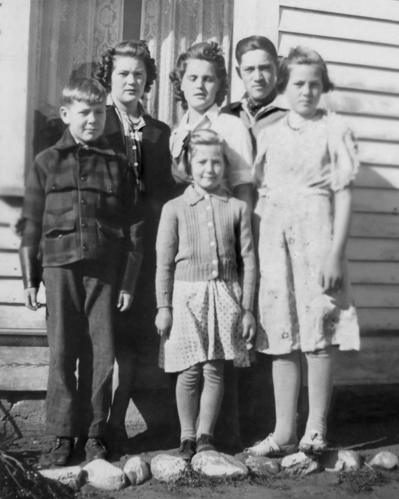 Sept 1941 • Children of Michael and Christina Shewchuk L to R  Paul (10) - Nettie (19) - Eleanor (17) - Steve (16) - Lena (12)- Kathleen (7). Taken on the famiy farm near Willingdon, AB.