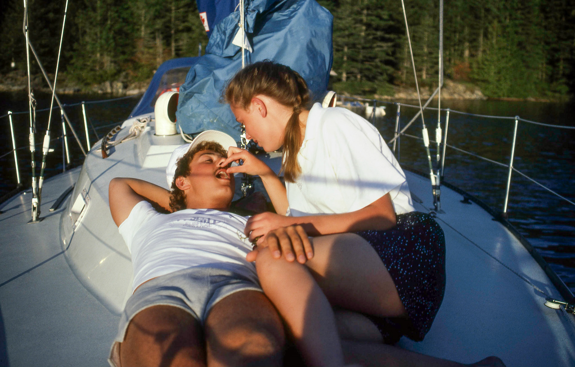 Circa 1986: Brian Huculak and unknown female - sailing through Desolation Sound, west coast of Vancouver, BC. Photo credit: Robert Keith