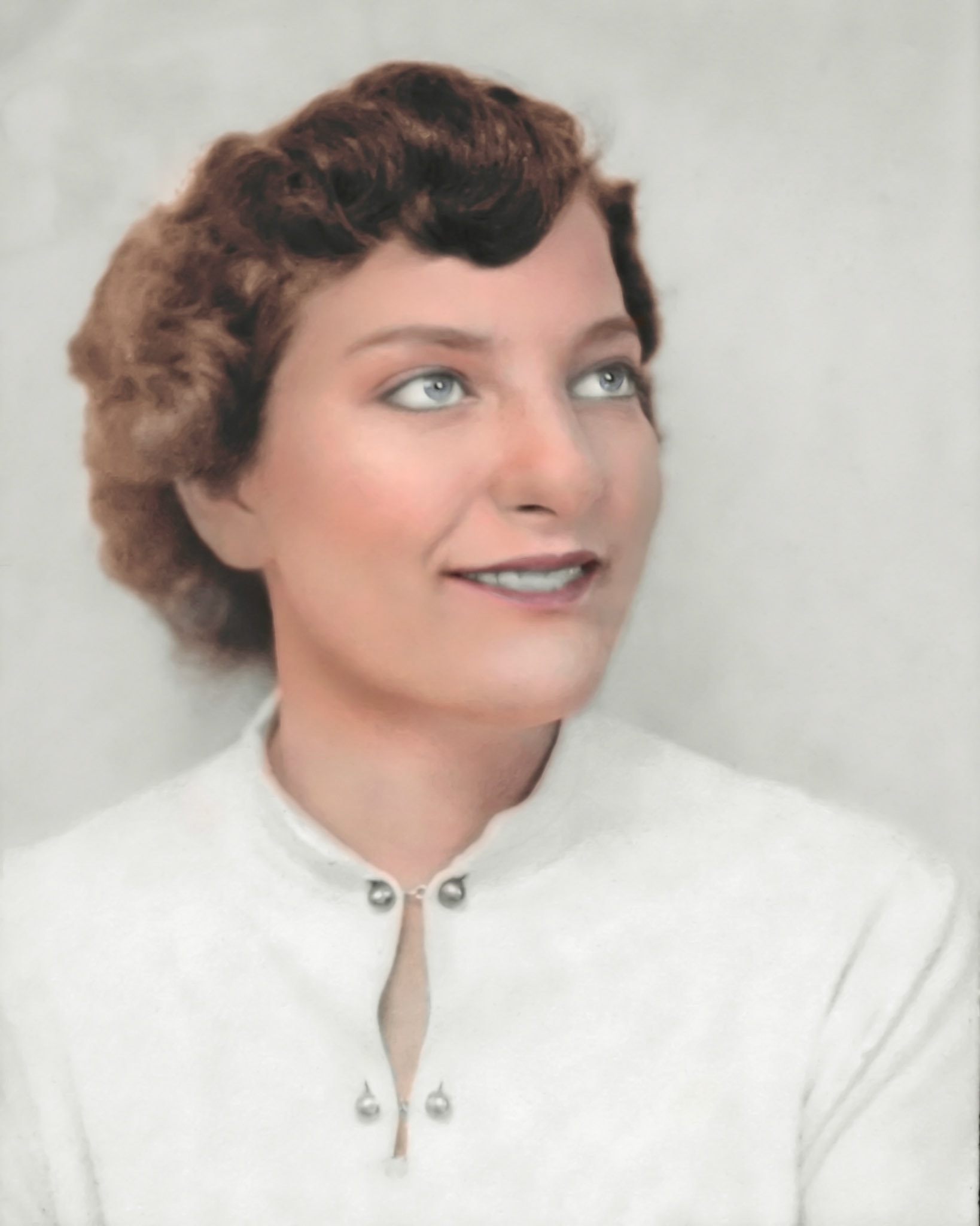 Evelyn Lumdsen c 1951. Restoration and colorization by Brian Huculak. Scan from 1.5"x2" monochrome photo booth print.