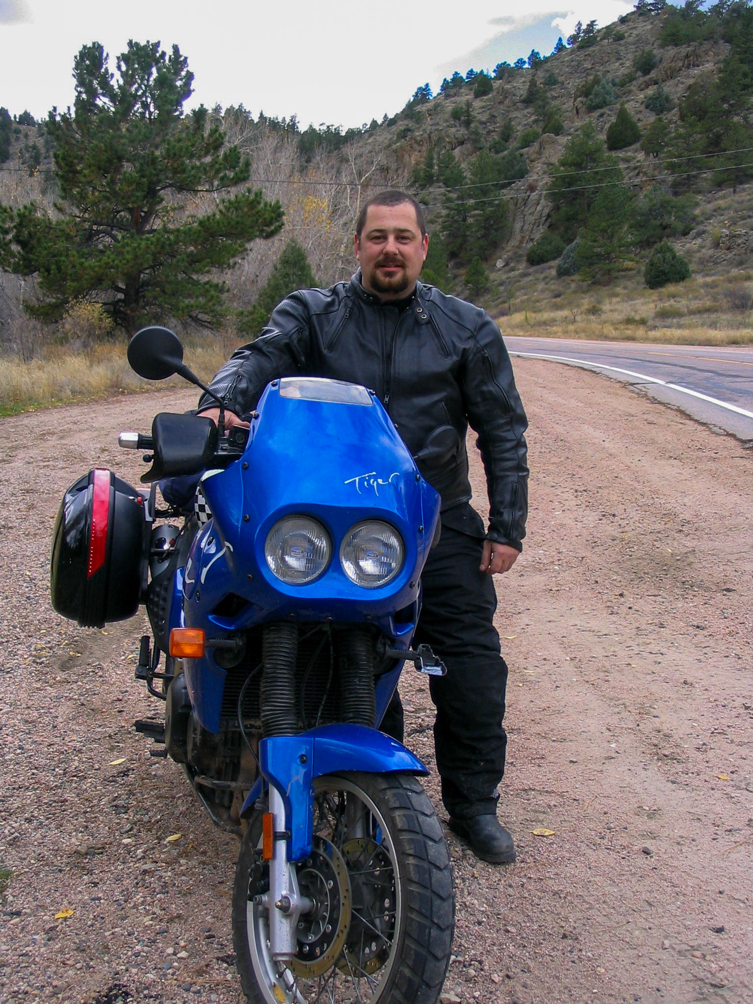 2003~2004: Colorado Rockies. Brian Huculak turns 77,777 kilometres on the 1997 Triumph Tiger. Photo credit: David Bosley