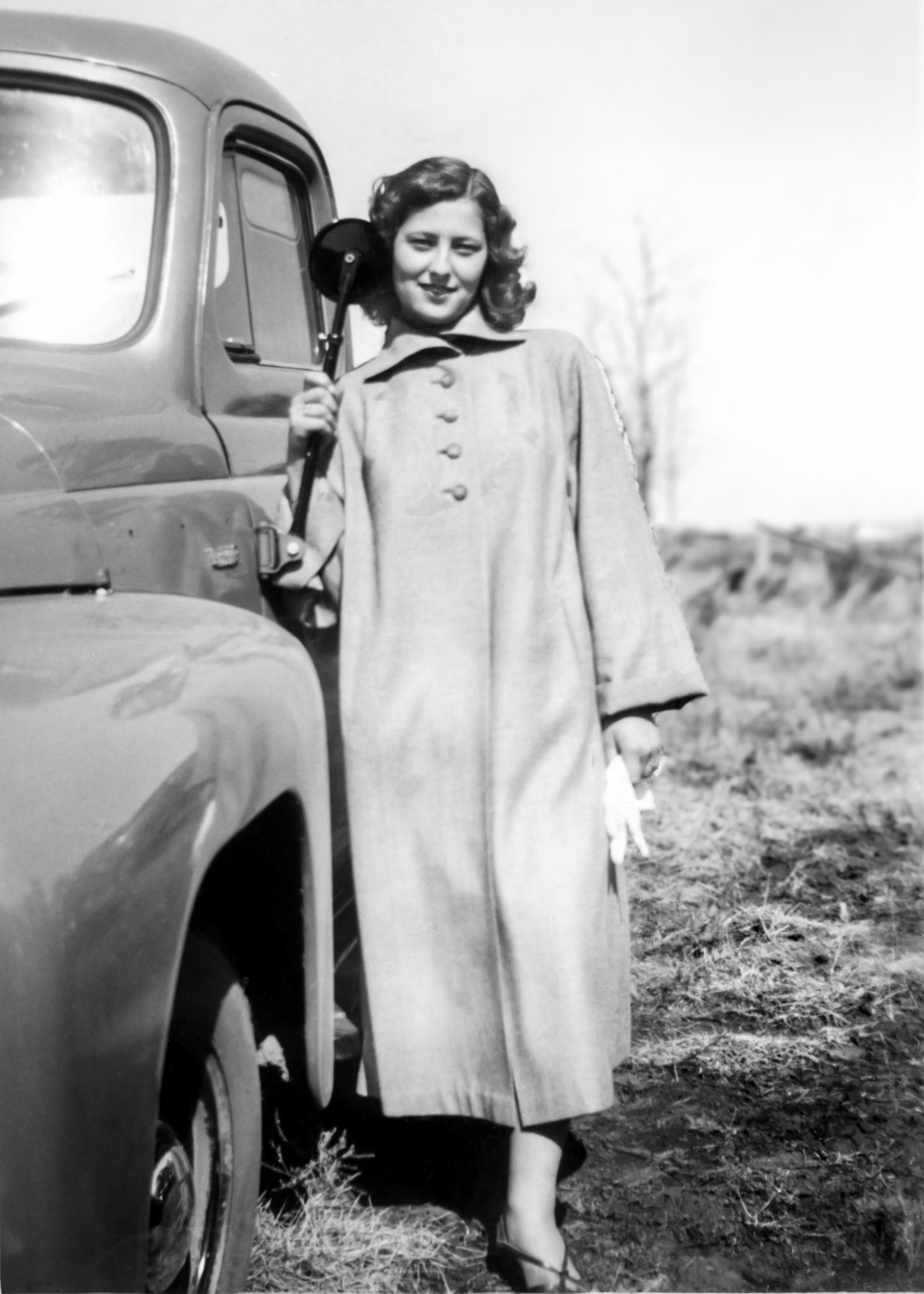 1952: Kathleen [Shewchuk] Huculak (age 18) next to a vintage 1950's pickup truck on the farm near Willingdon, Alberta.