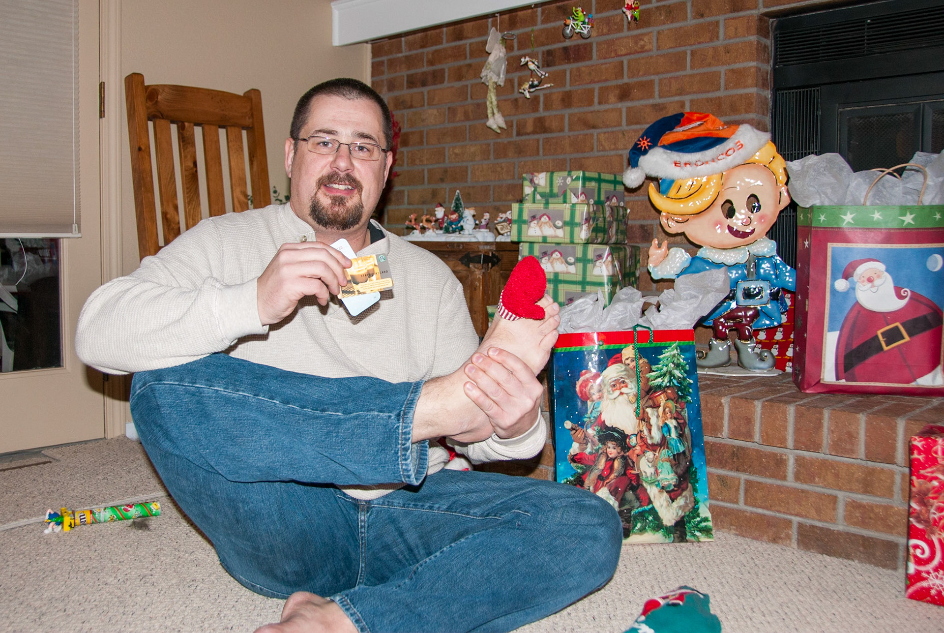 20 Dec 2007: Christmas in Aurora, Colorado. Brian tries on new socks. Photo credit: Paula Rosson (spouse)
