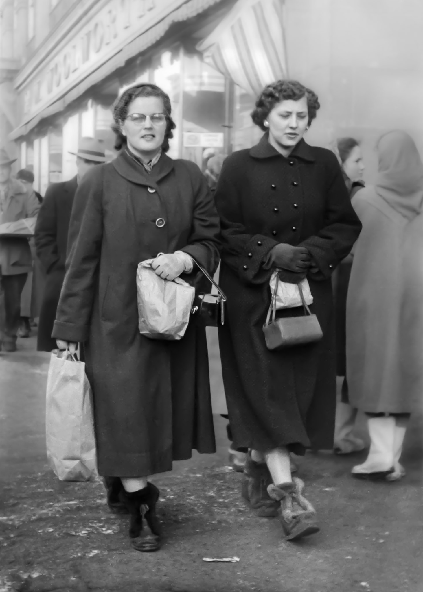 1953 • Eleanor [Shewchuk] Romanko (29) and sister Kathleen Shewchuk (19) on a shopping spree in Edmonton, AB