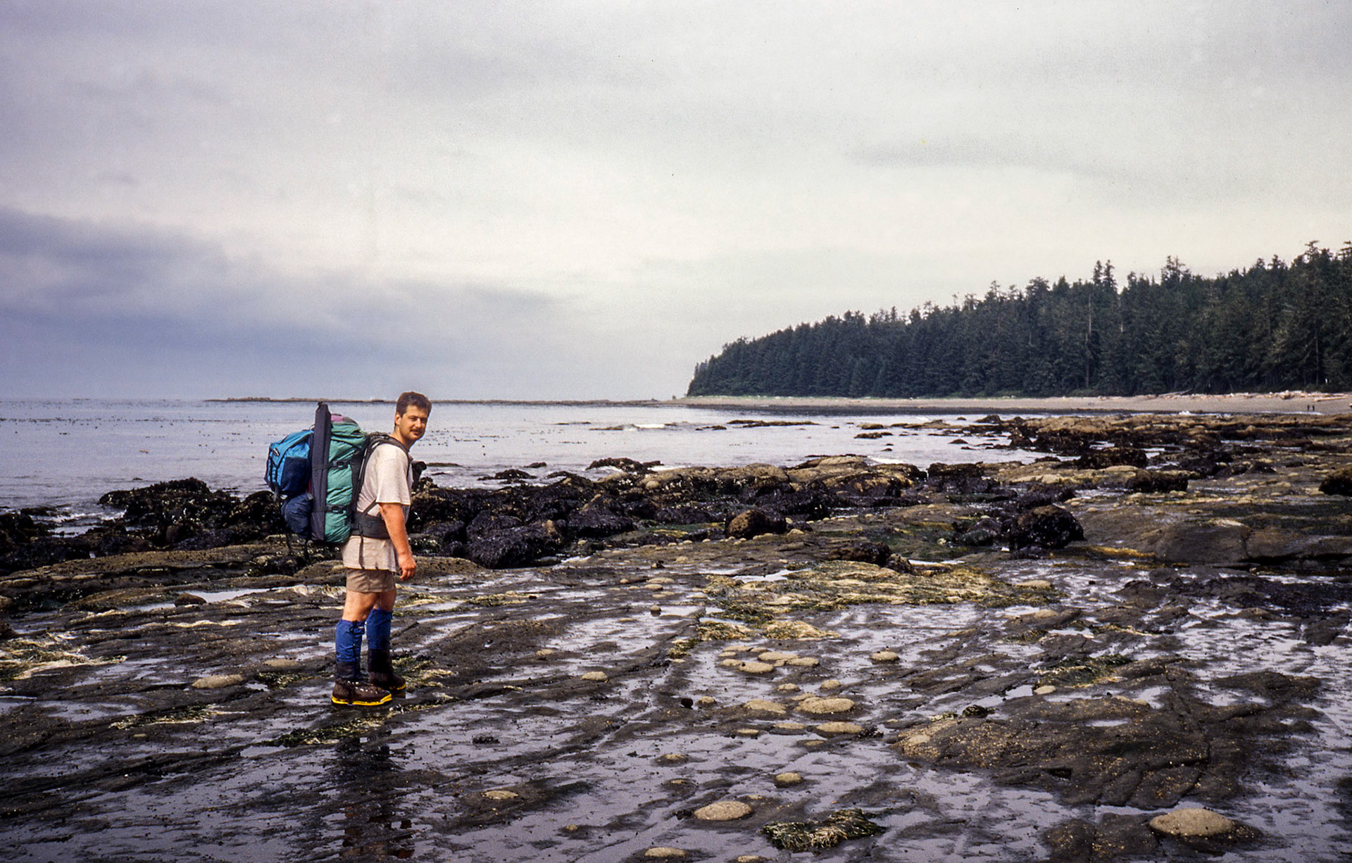 Low Tide circa 1989: Brian Huculak (approx age 25) on the West Coast Trail - west coast of Vancouver Island, BC. Photo credit: Robert Keith.