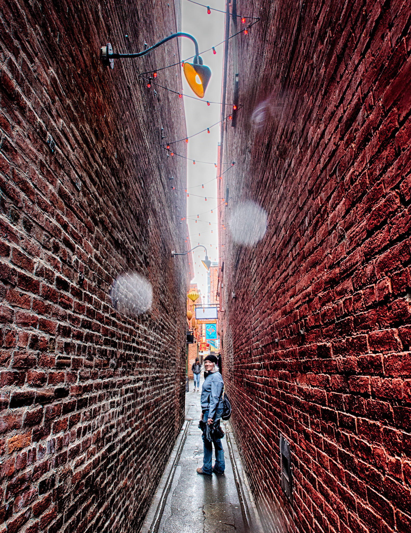 15 June 2017: Victoria BC. Paula Rosson (spouse of Brian Huculak). Tight quarters wandering side streets in Victoria. Photo credit: Brian M Huculak